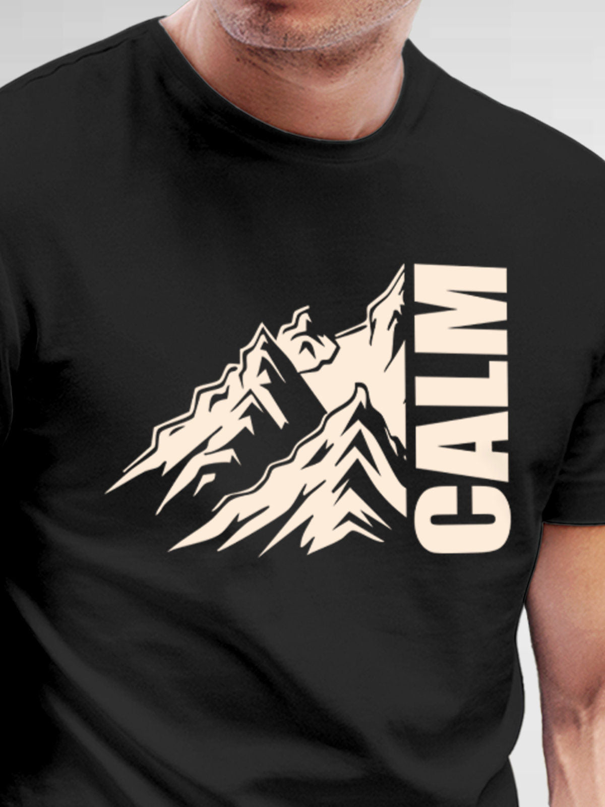 Close up of 'Calm' design on Men's Dark Grey Round Neck T-shirt, highlighting intricate details and vibrant print.