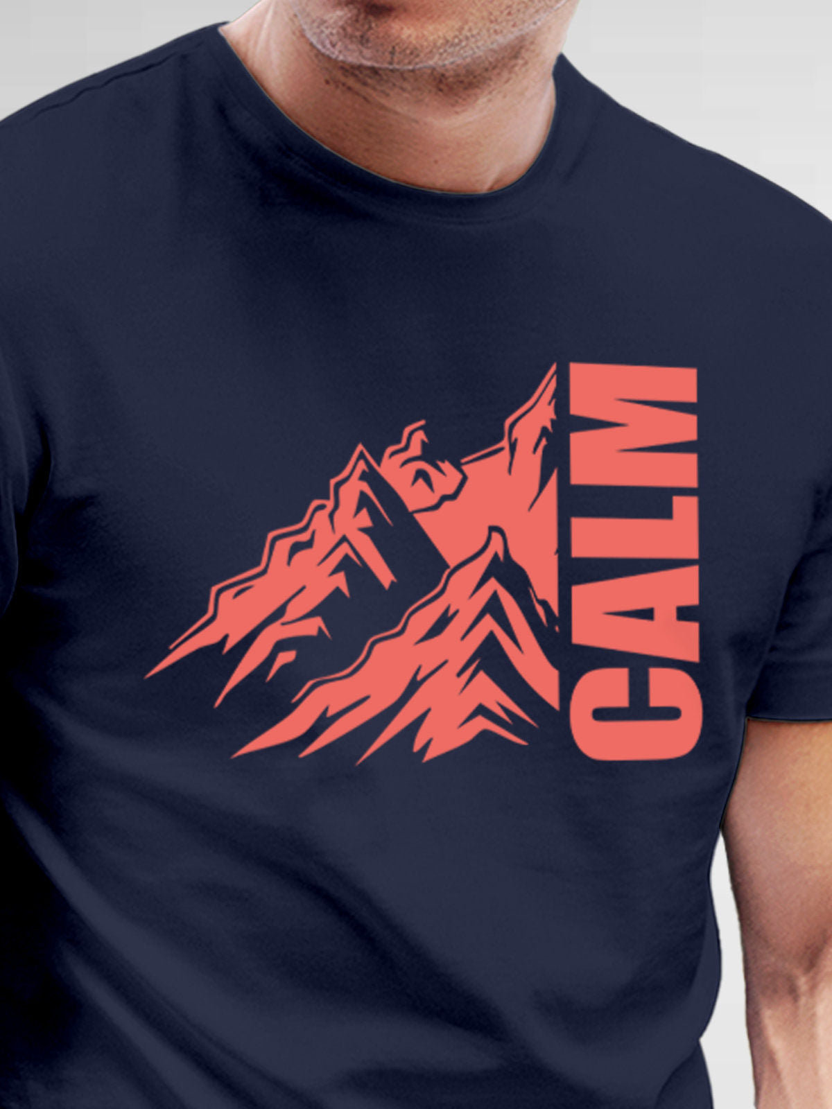 Close up of 'Calm' design on Men's Navy Blue Round Neck T-shirt, highlighting intricate details and vibrant print.