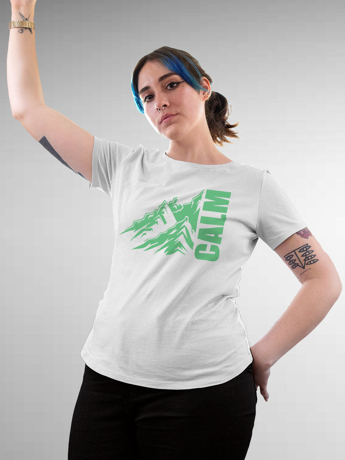 Model wearing Women's White Round Neck T-shirt with 'Calm' design, offering effortless style and premium comfort