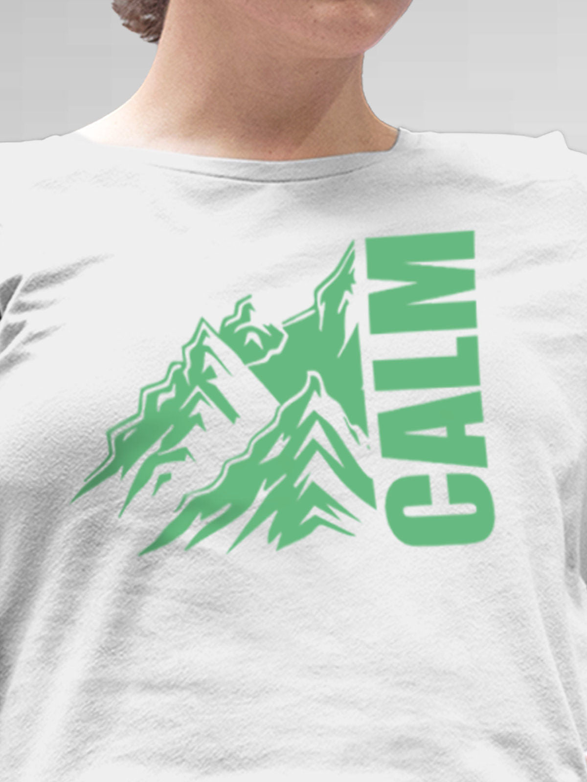 Close up of 'Calm' design on Women's White Round Neck T-shirt, highlighting intricate details and vibrant print.