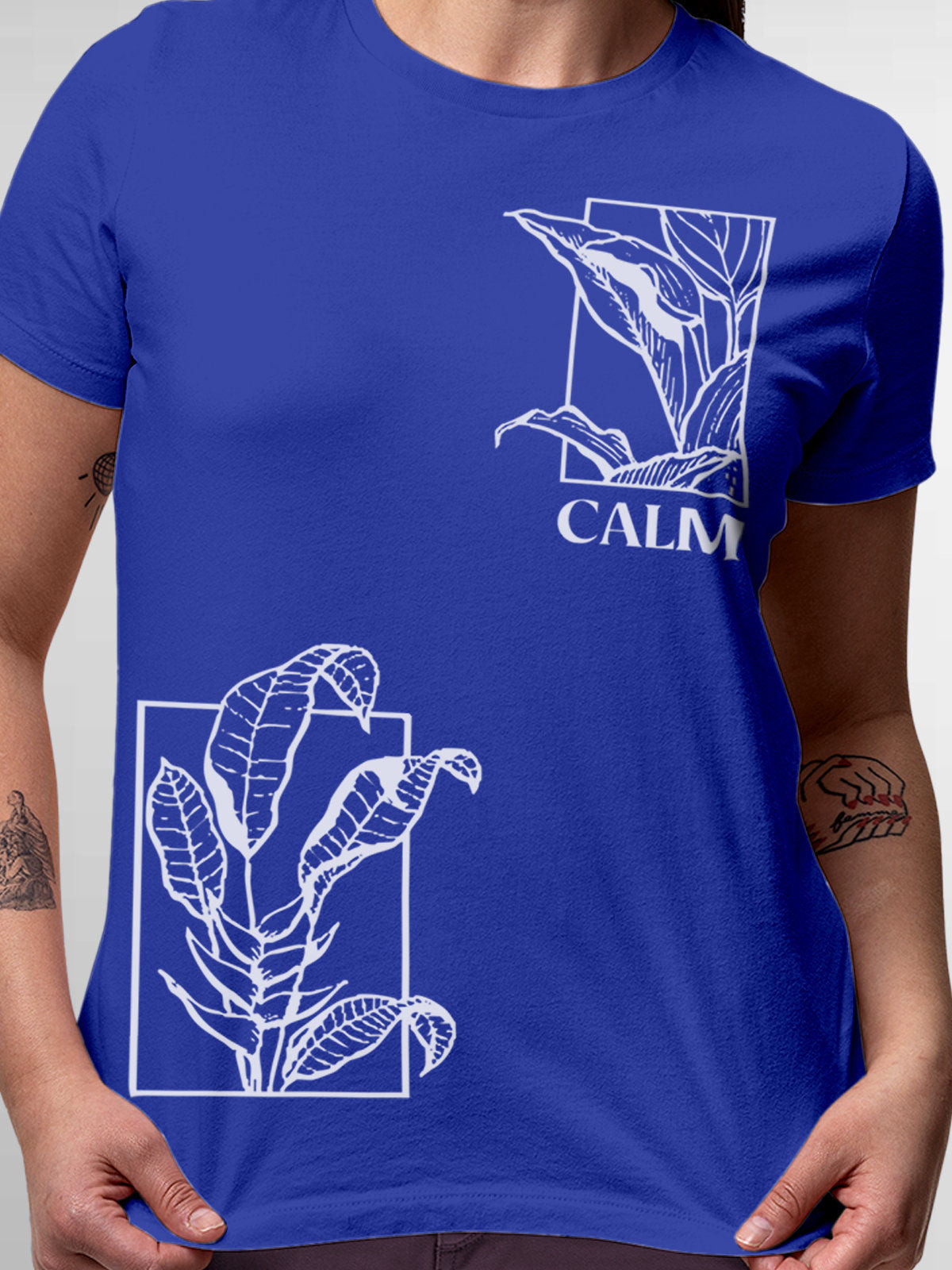 Close up of 'Calm' design on Women's Blue Round Neck T-shirt, highlighting intricate details and vibrant print.