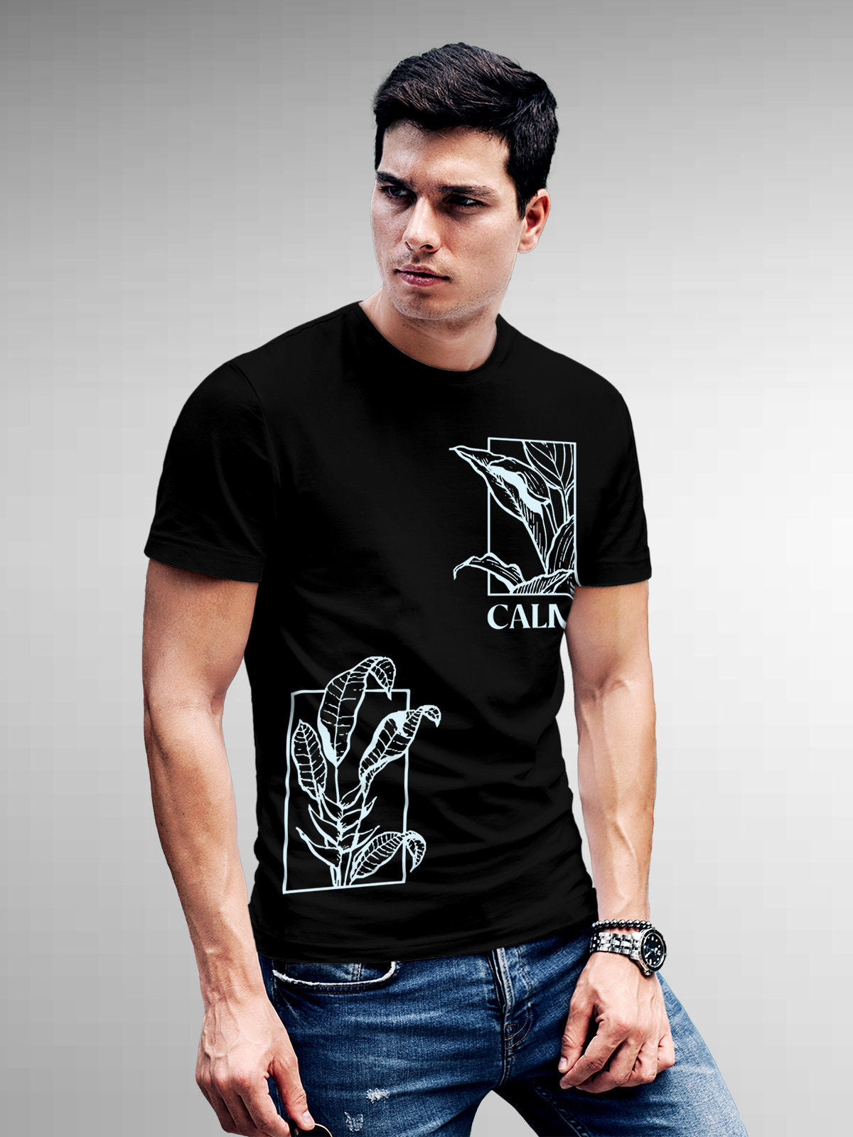 Model wearing Men's Black Round Neck T-shirt with 'Calm' design, offering effortless style and premium comfort