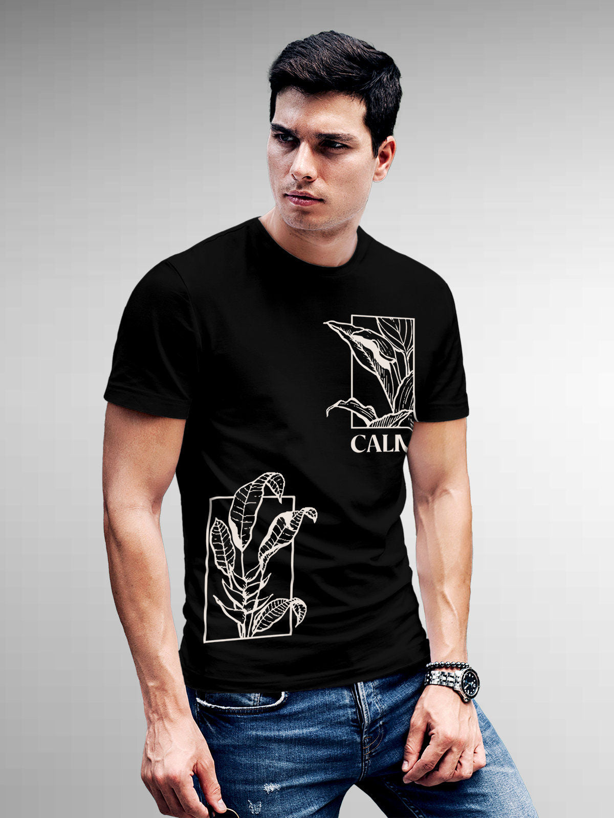 Model wearing Men's Black Round Neck T-shirt with 'Calm' design, offering effortless style and premium comfort
