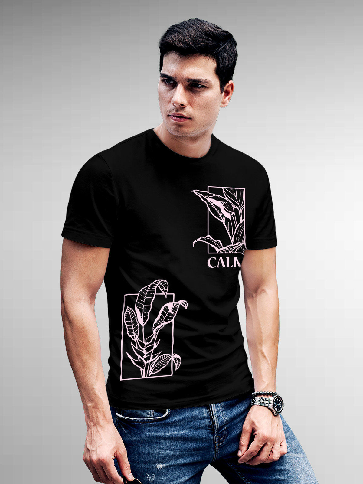 Model wearing Men's Black Round Neck T-shirt with 'Calm' design, offering effortless style and premium comfort