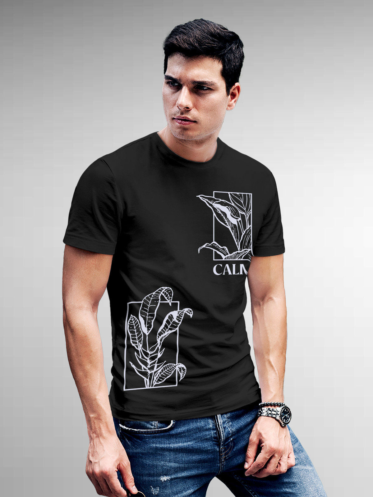 Model wearing Men's Dark Grey Round Neck T-shirt with 'Calm' design, offering effortless style and premium comfort