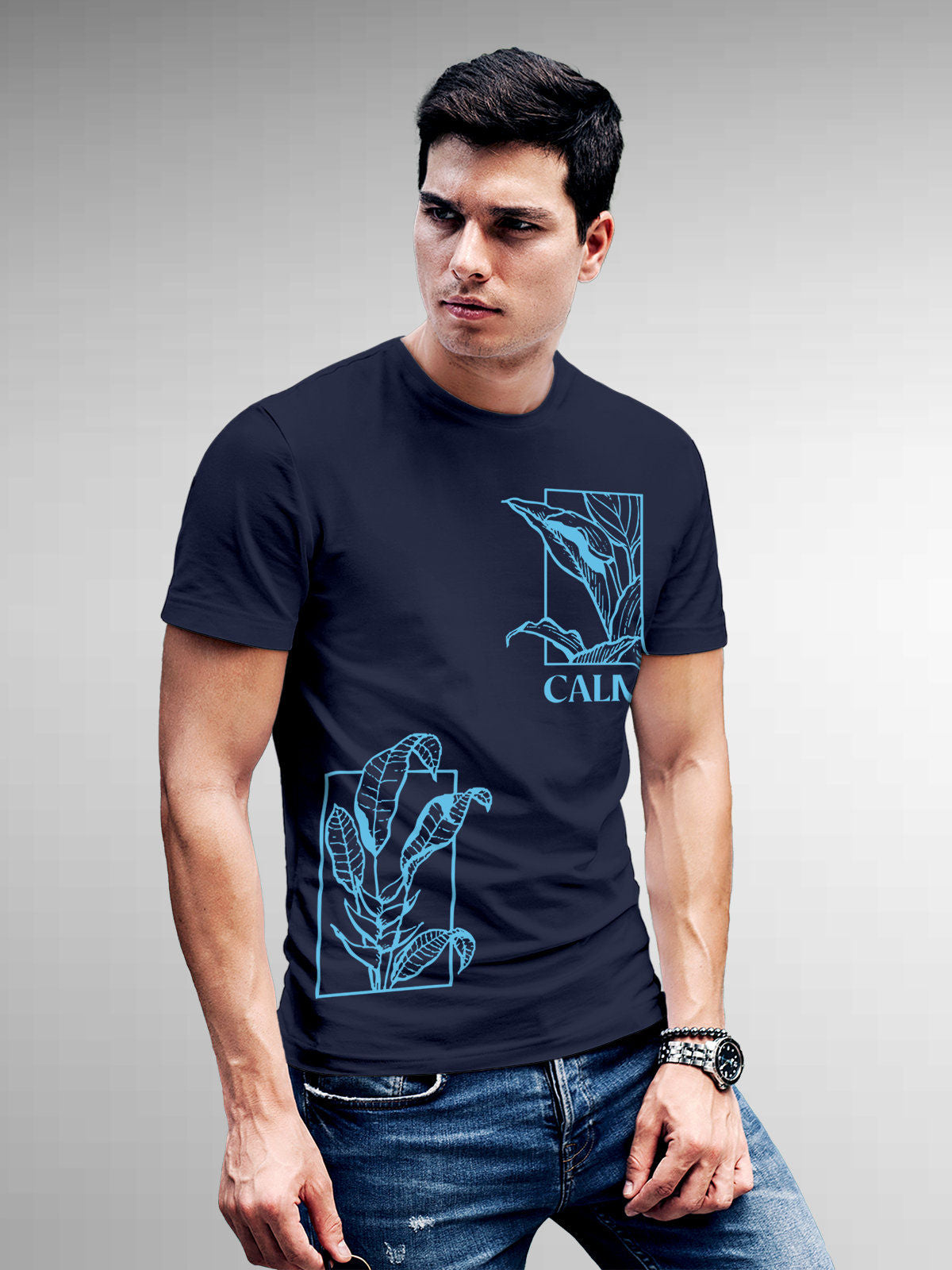 Model wearing Men's Navy Blue Round Neck T-shirt with 'Calm' design, offering effortless style and premium comfort