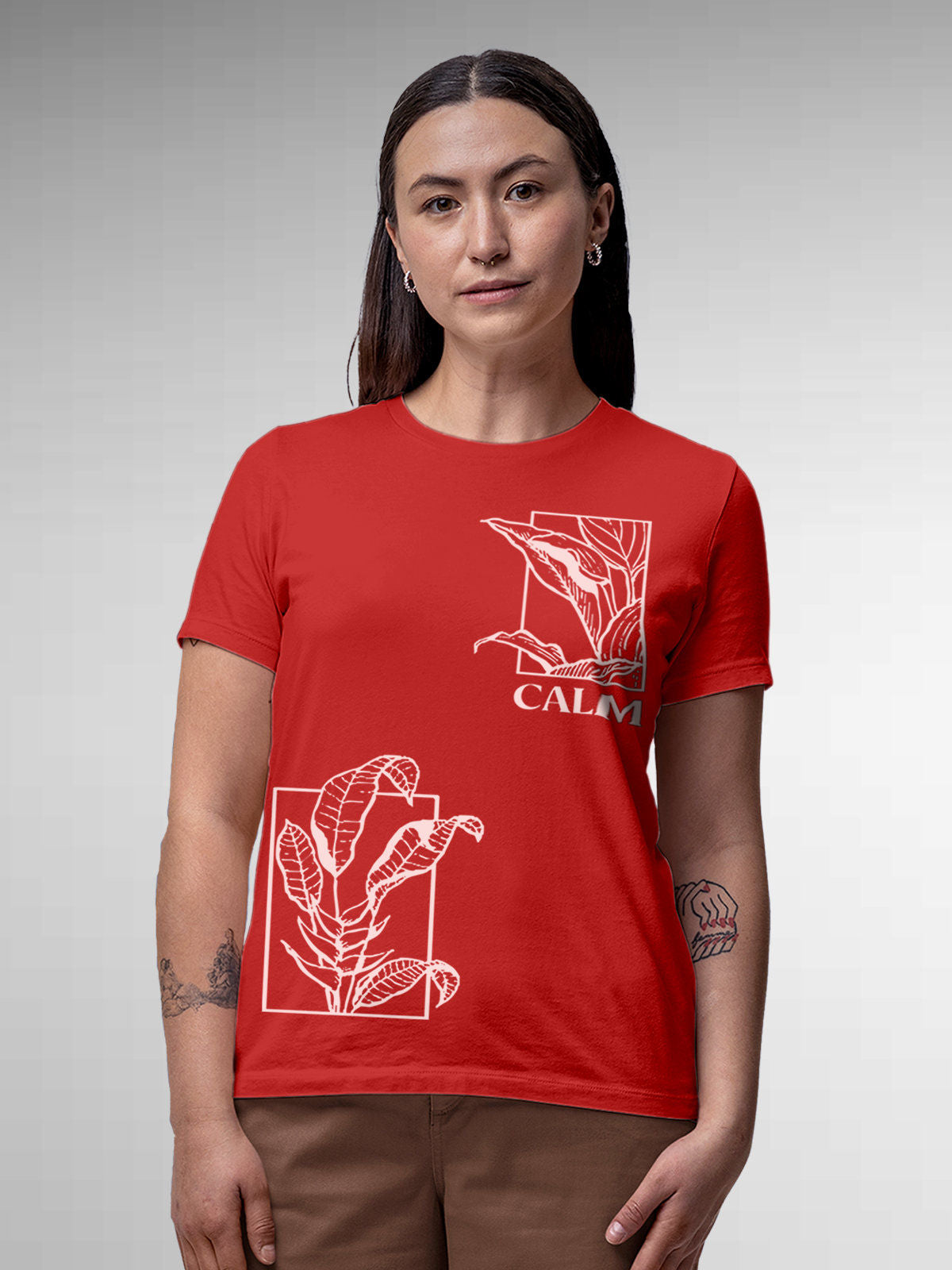 Model wearing Women's Red Round Neck T-shirt with 'Calm' design, offering effortless style and premium comfort