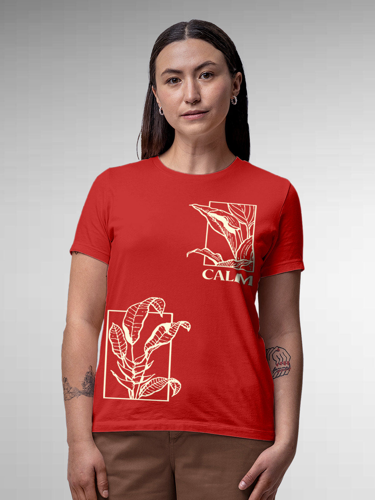 Model wearing Women's Red Round Neck T-shirt with 'Calm' design, offering effortless style and premium comfort
