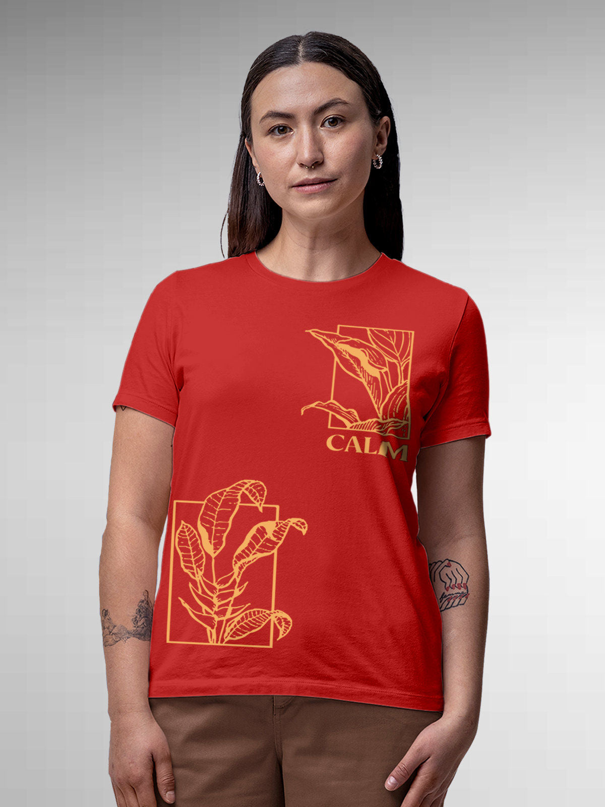 Model wearing Women's Red Round Neck T-shirt with 'Calm' design, offering effortless style and premium comfort