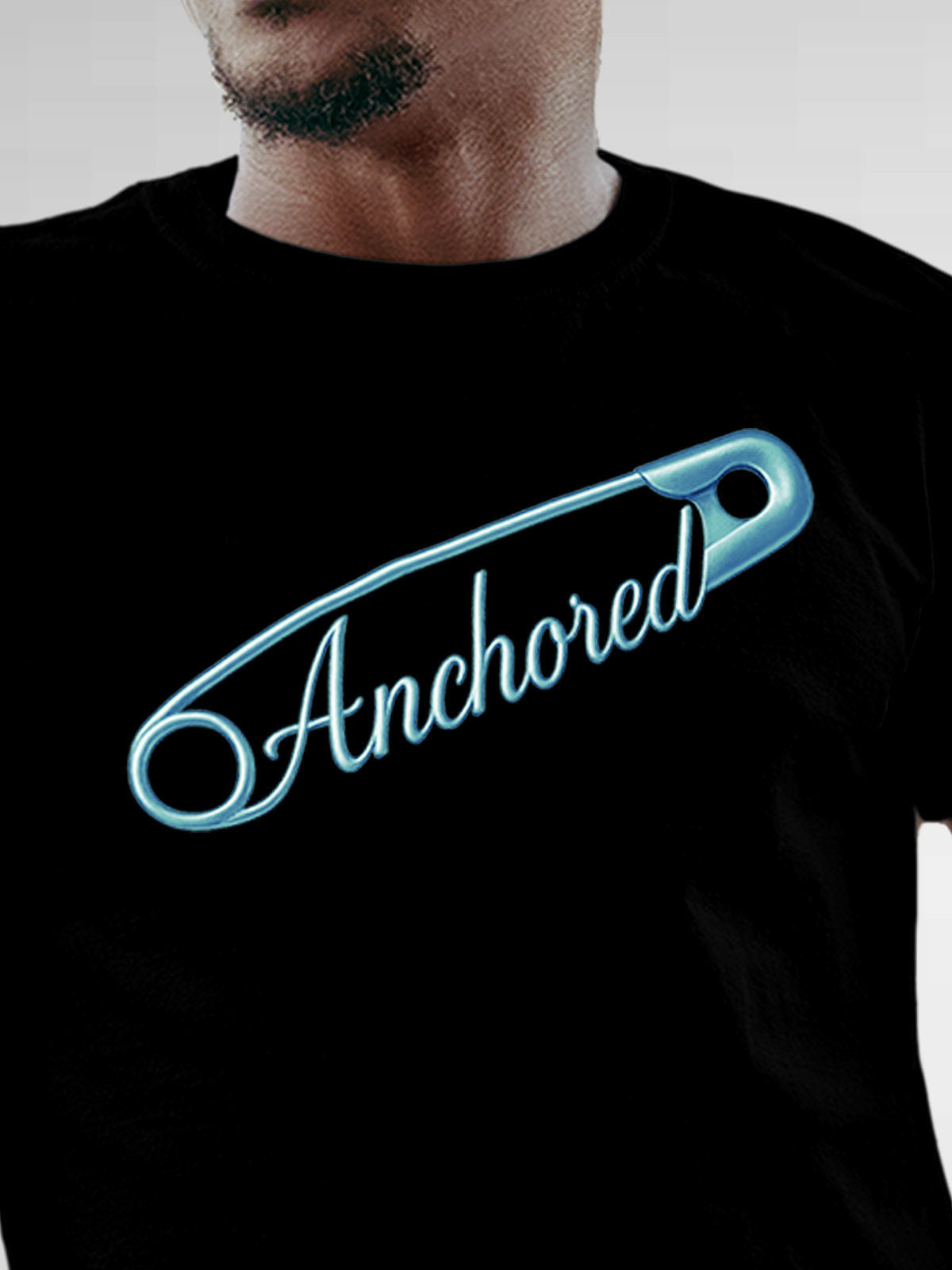 Close up of 'Anchored' design on Men's Black Round Neck T-shirt, highlighting intricate details and vibrant print.