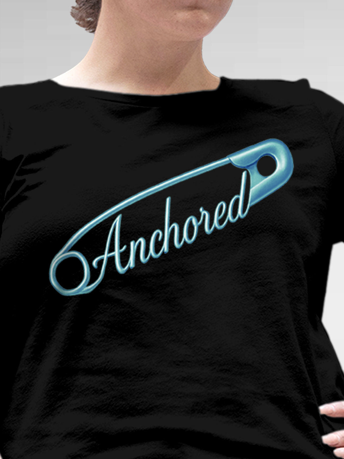 Close up of 'Anchored' design on Women's Black Round Neck T-shirt, highlighting intricate details and vibrant print.