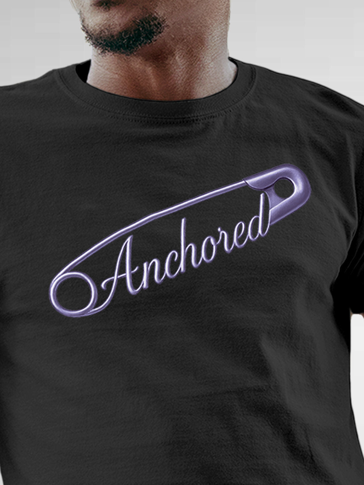 Close up of 'Anchored' design on Men's Dark Grey Round Neck T-shirt, highlighting intricate details and vibrant print.