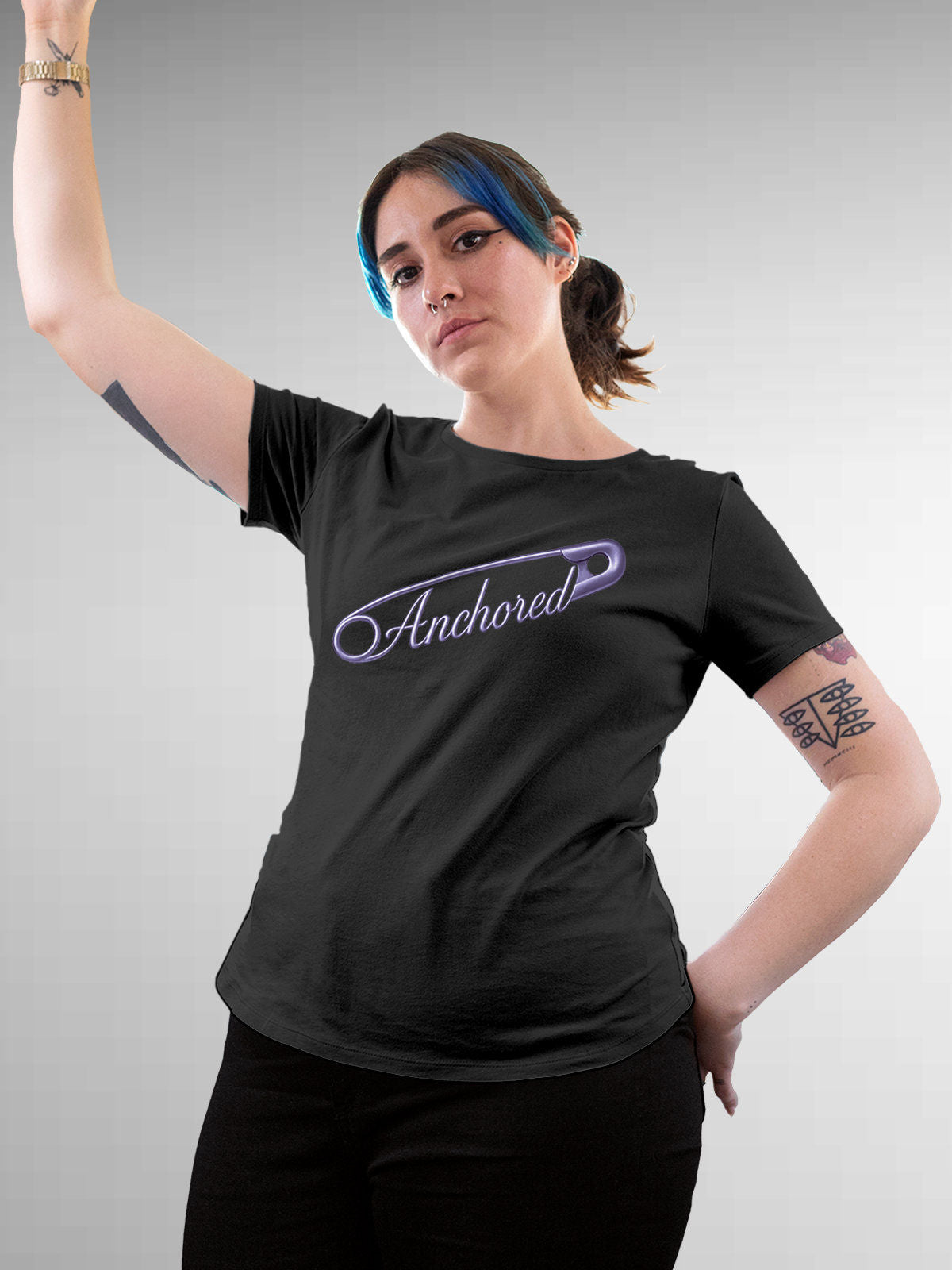 Model wearing Women's Dark Grey Round Neck T-shirt with 'Anchored' design, offering effortless style and premium comfort