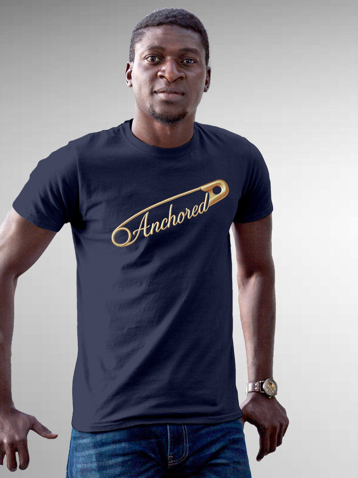 Model wearing Men's Navy Blue Round Neck T-shirt with 'Anchored' design, offering effortless style and premium comfort