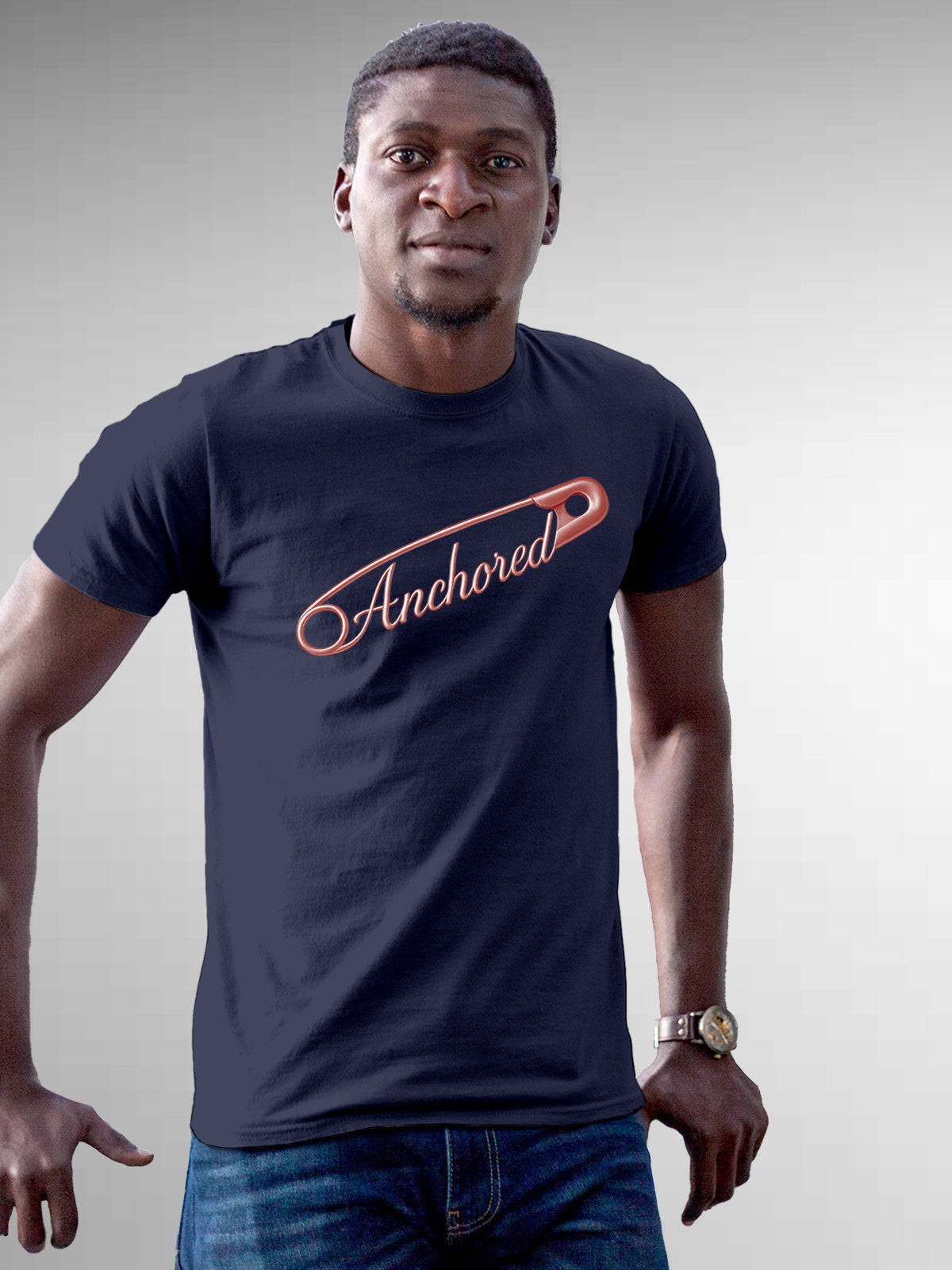 Model wearing Men's Navy Blue Round Neck T-shirt with 'Anchored' design, offering effortless style and premium comfort