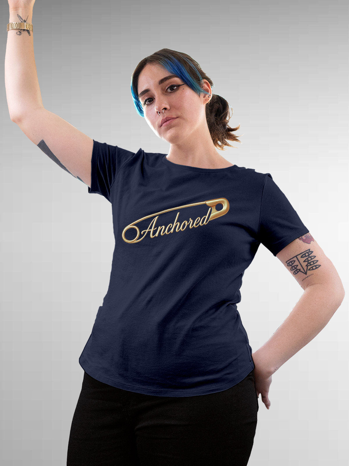 Model wearing Women's Navy Blue Round Neck T-shirt with 'Anchored' design, offering effortless style and premium comfort