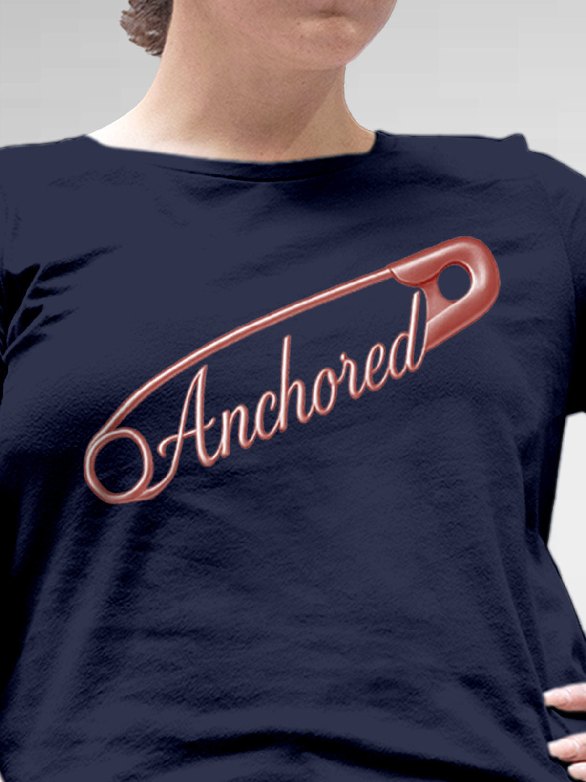 Close up of 'Anchored' design on Women's Navy Blue Round Neck T-shirt, highlighting intricate details and vibrant print.