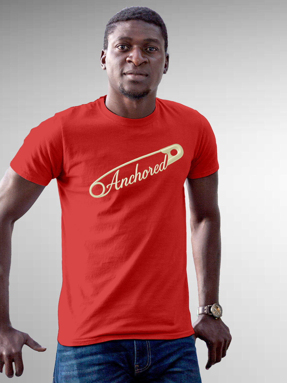 Model wearing Men's Red Round Neck T-shirt with 'Anchored' design, offering effortless style and premium comfort