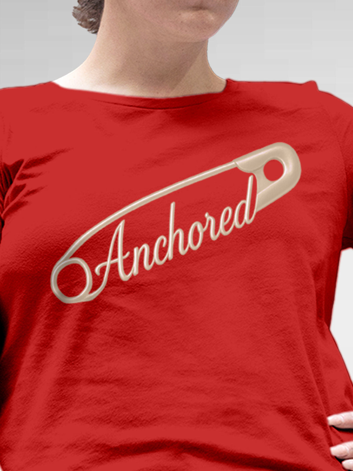 Close up of 'Anchored' design on Women's Red Round Neck T-shirt, highlighting intricate details and vibrant print.