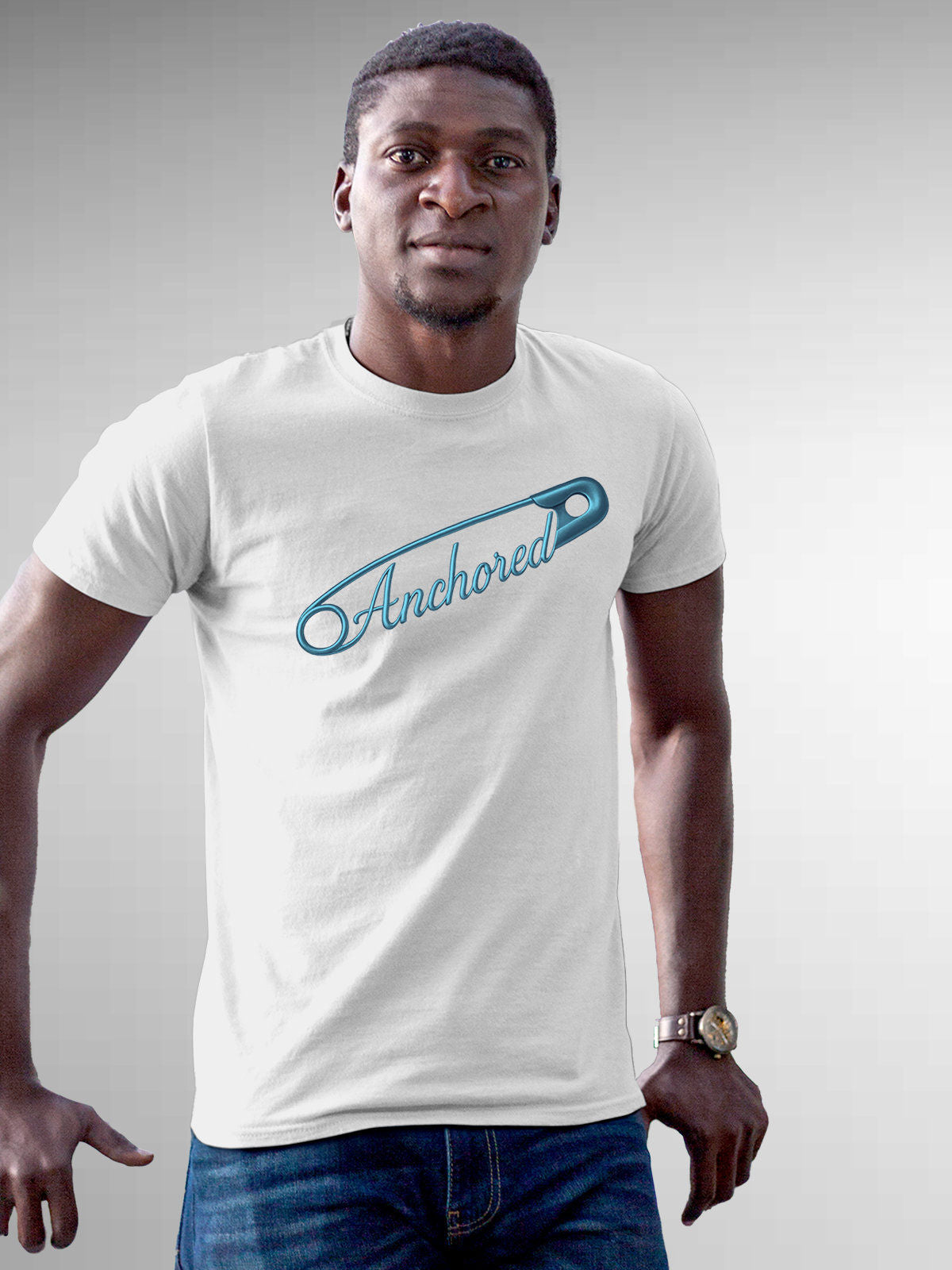Model wearing Men's White Round Neck T-shirt with 'Anchored' design, offering effortless style and premium comfort