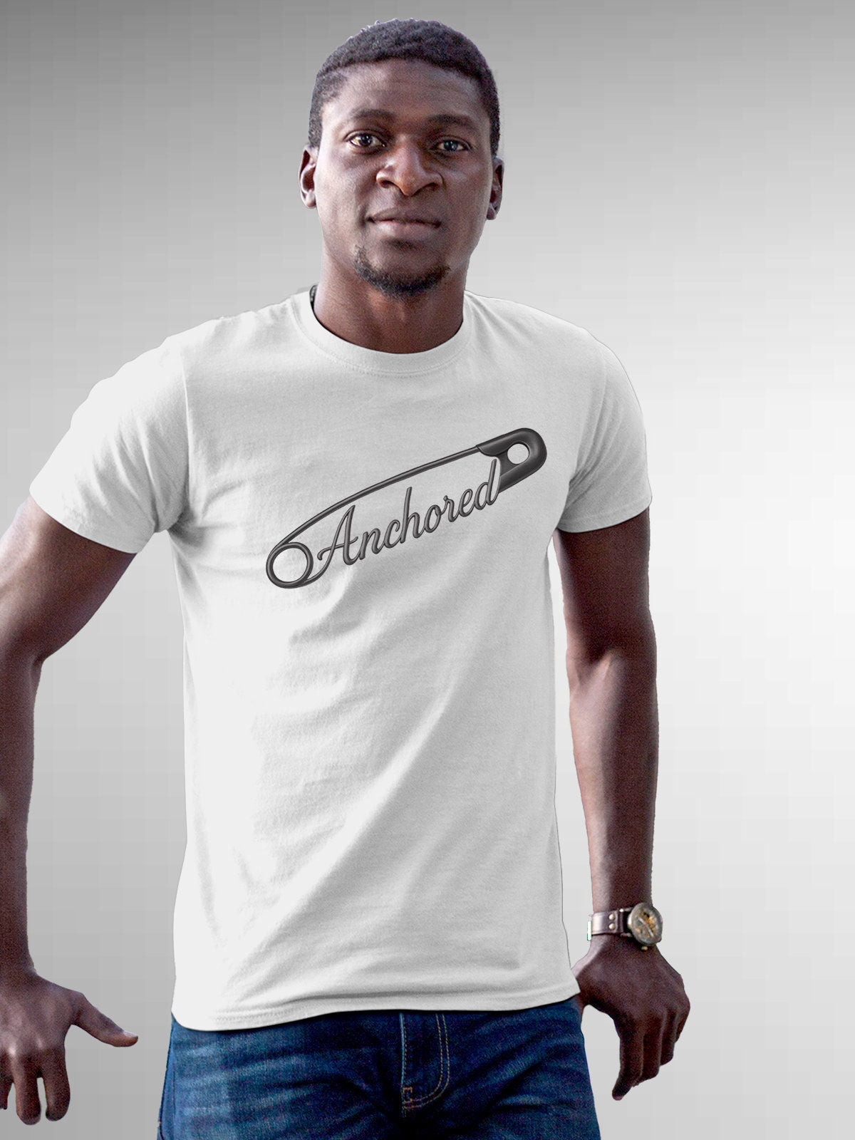 Model wearing Men's White Round Neck T-shirt with 'Anchored' design, offering effortless style and premium comfort