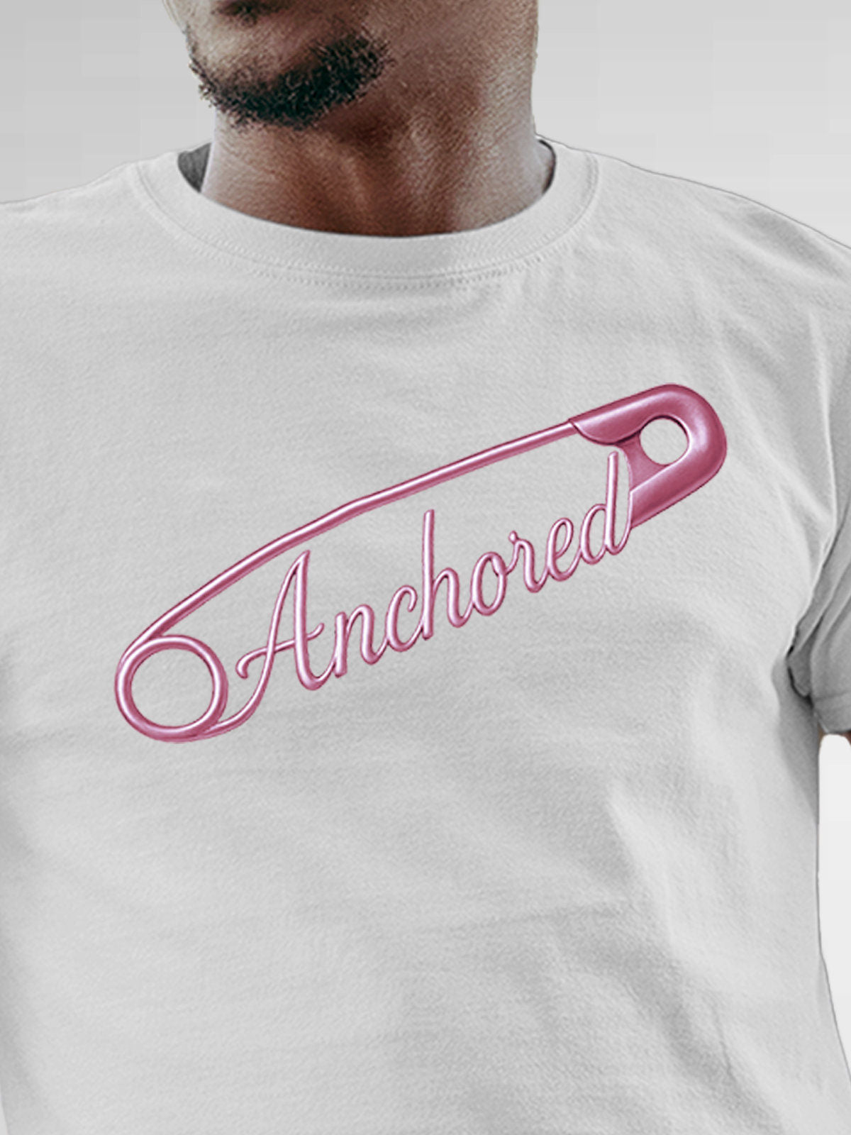 Close up of 'Anchored' design on Men's White Round Neck T-shirt, highlighting intricate details and vibrant print.