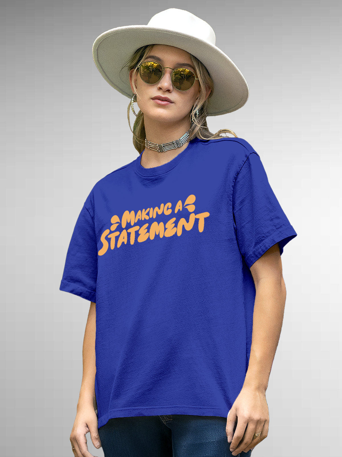 Model wearing Women's Blue Round Neck T-shirt with 'Making A Statement' design, offering effortless style and premium comfort