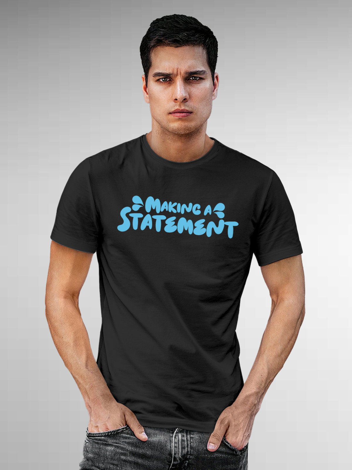 Model wearing Men's Dark Grey Round Neck T-shirt with 'Making A Statement' design, offering effortless style and premium comfort
