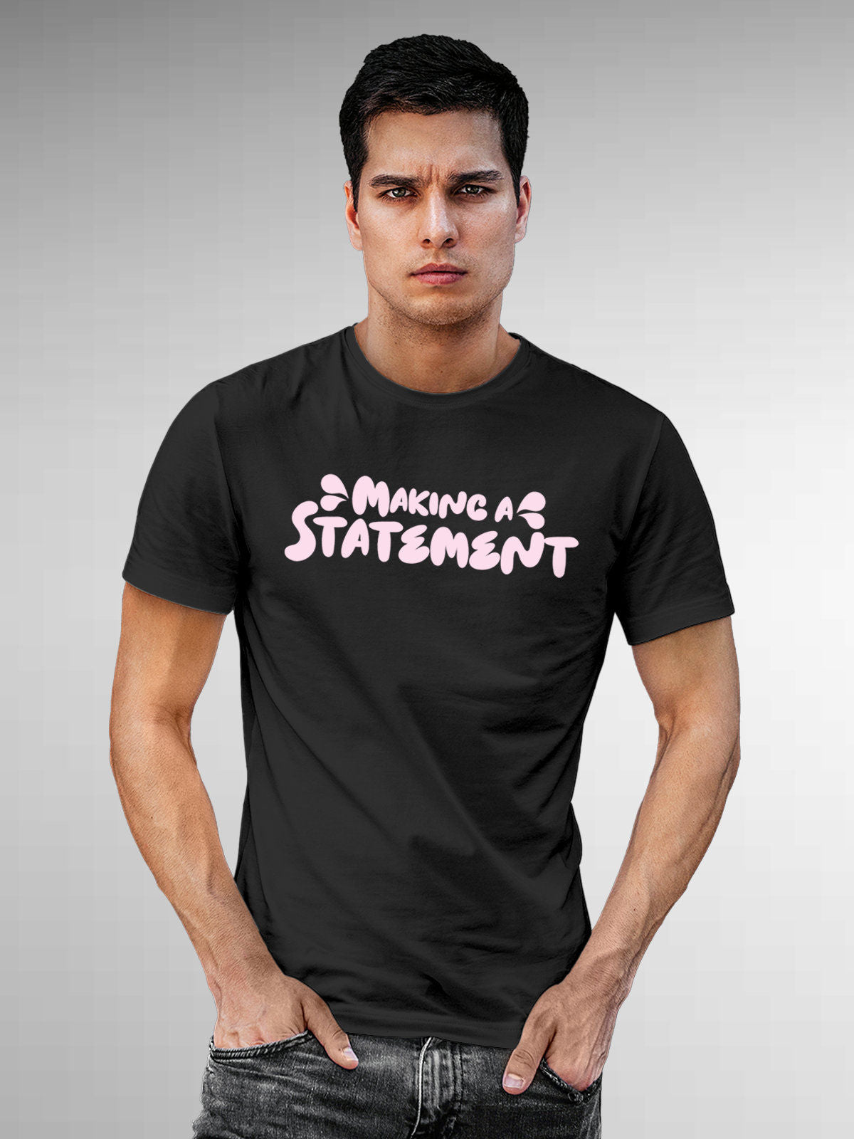 Model wearing Men's Dark Grey Round Neck T-shirt with 'Making A Statement' design, offering effortless style and premium comfort