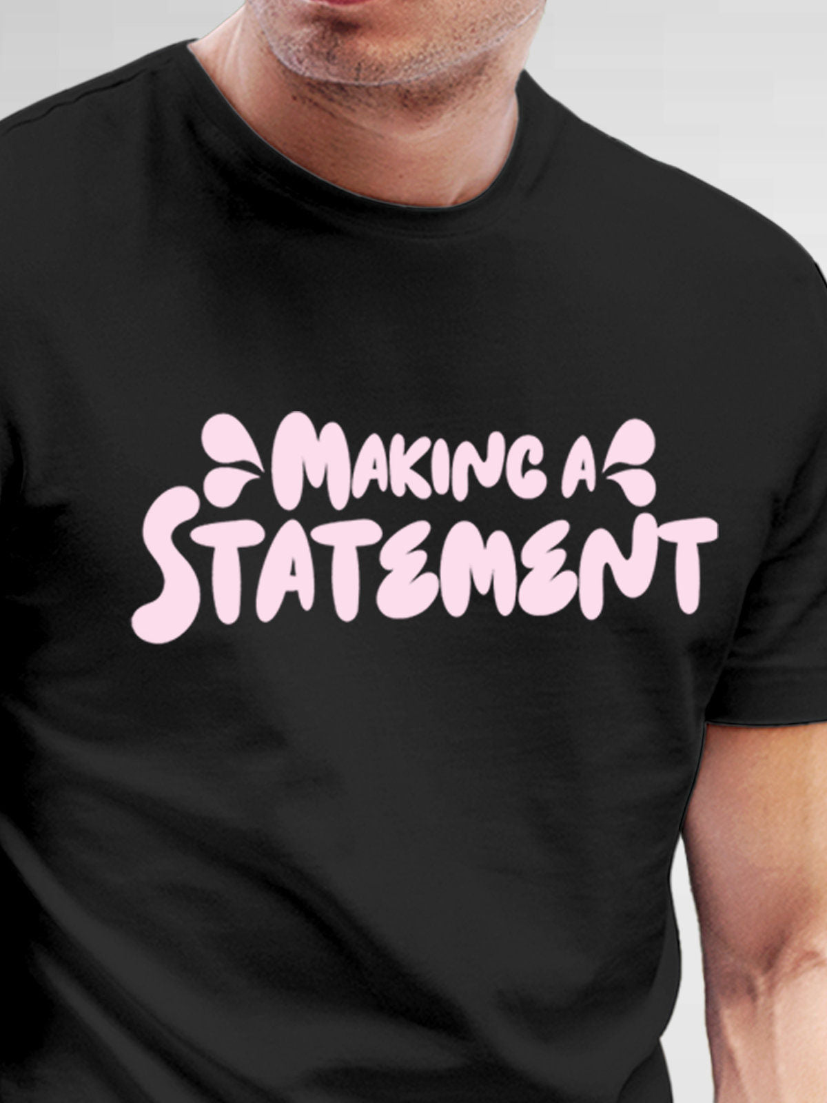 Close up of 'Making A Statement' design on Men's Dark Grey Round Neck T-shirt, highlighting intricate details and vibrant print.