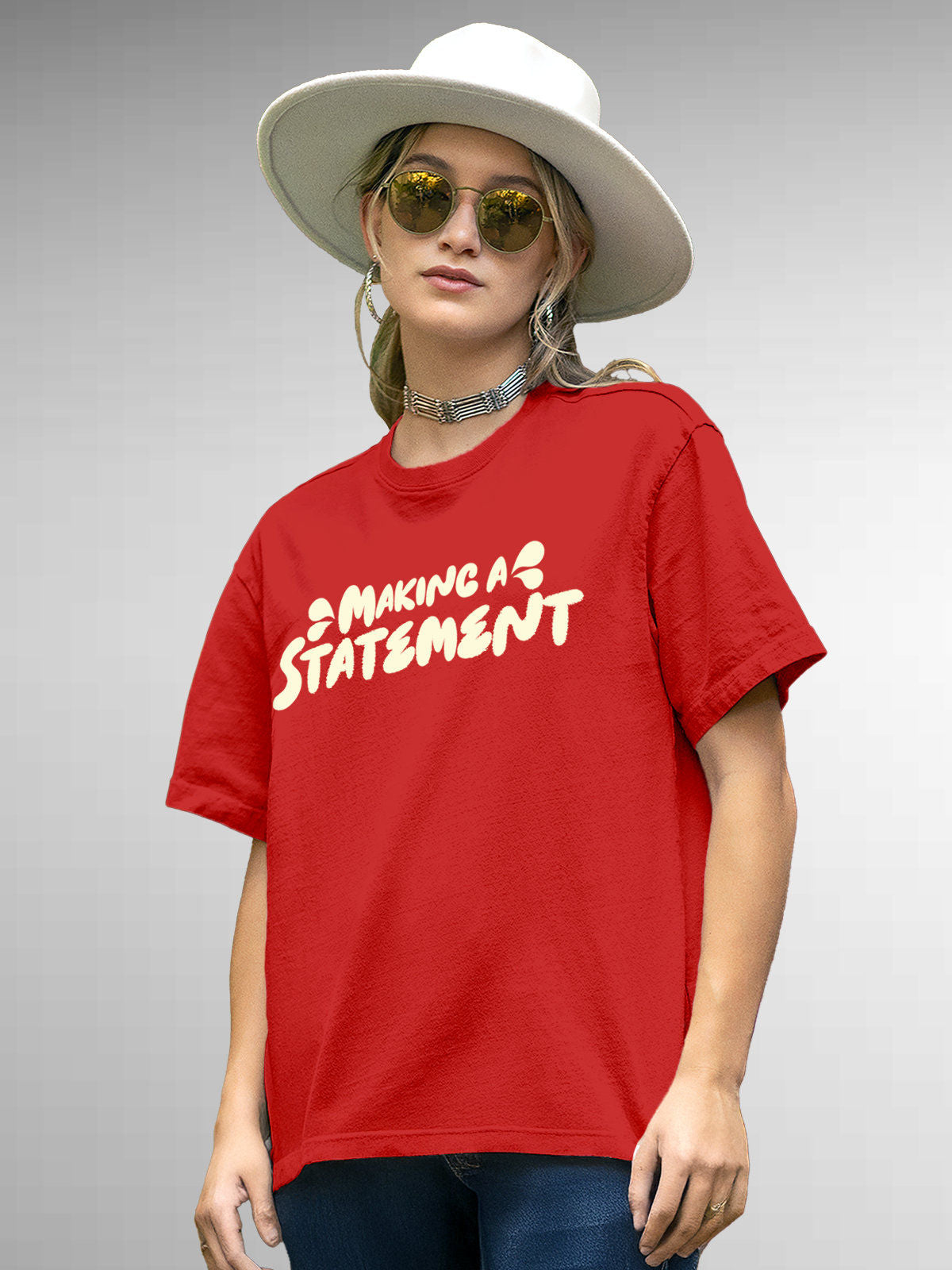 Model wearing Women's Red Round Neck T-shirt with 'Making A Statement' design, offering effortless style and premium comfort
