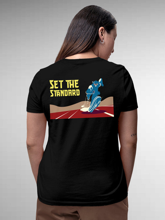 Model wearing Women's Black Round Neck T-shirt with 'Set The Standard' design, offering effortless style and premium comfort