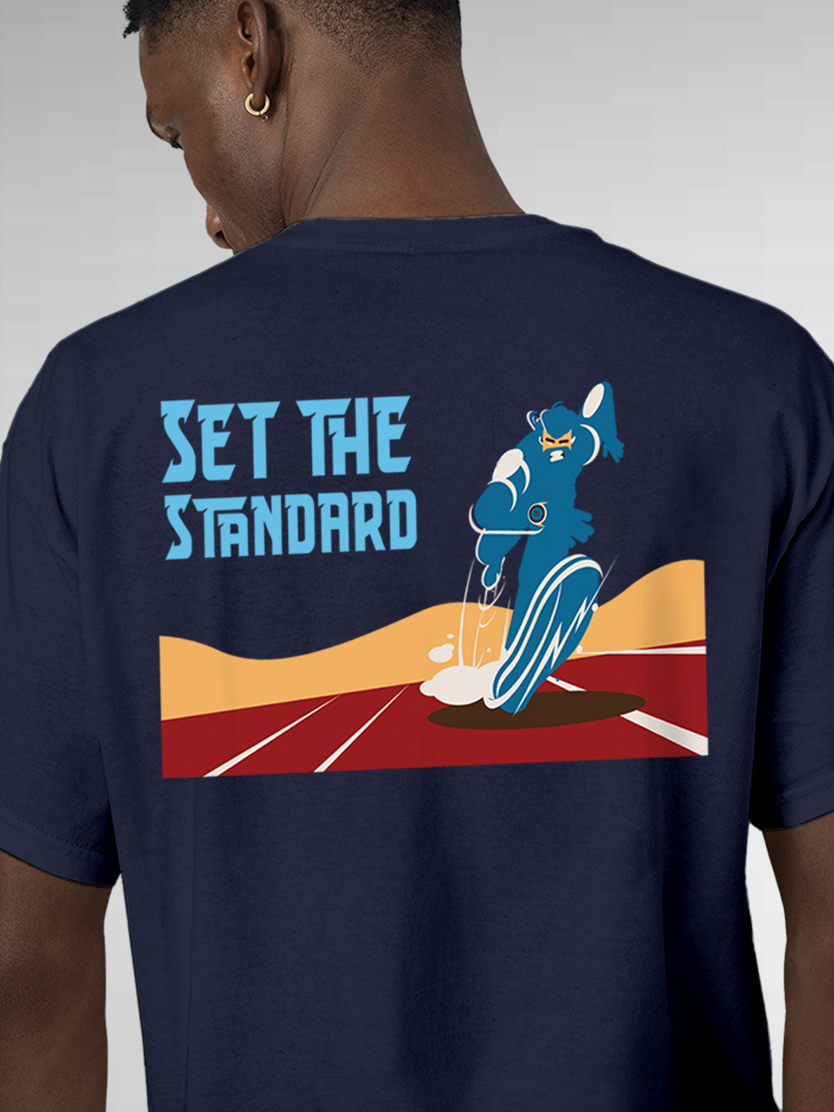 Close up of 'Set The Standard' design on Men's Navy Blue Round Neck T-shirt, highlighting intricate details and vibrant print.