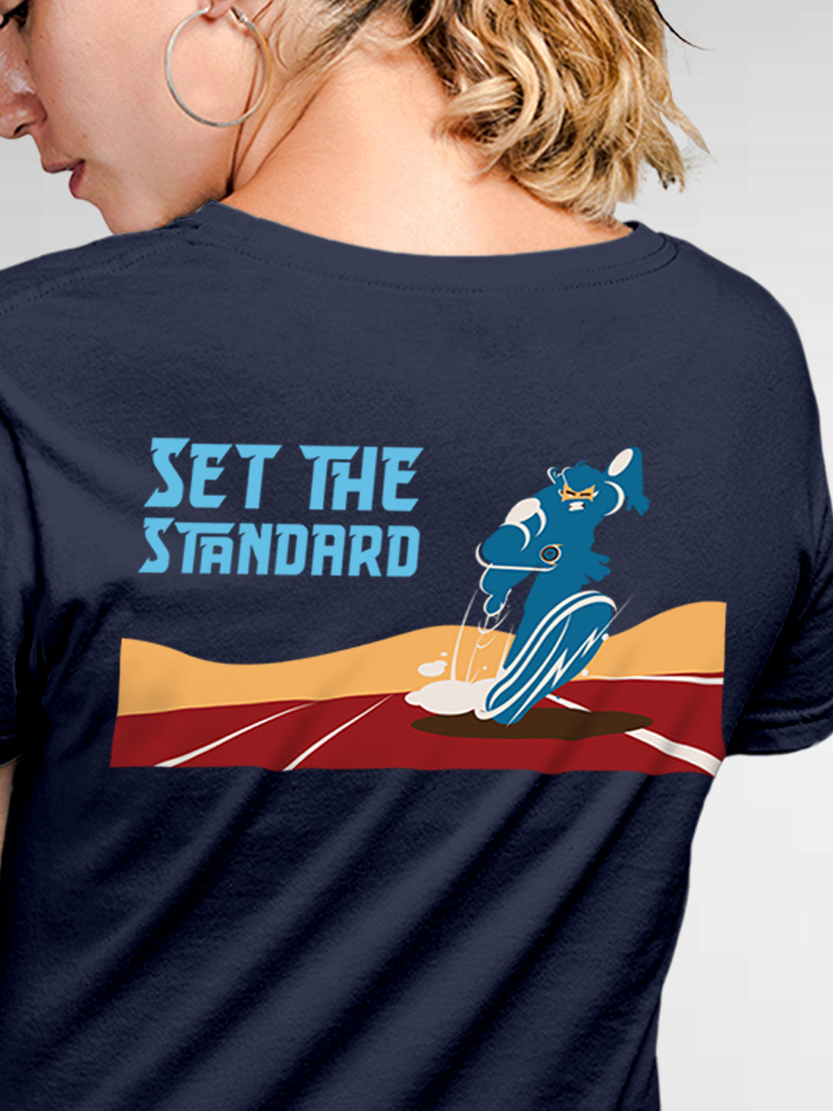 Close up of 'Set The Standard' design on Women's Navy Blue Round Neck T-shirt, highlighting intricate details and vibrant print.
