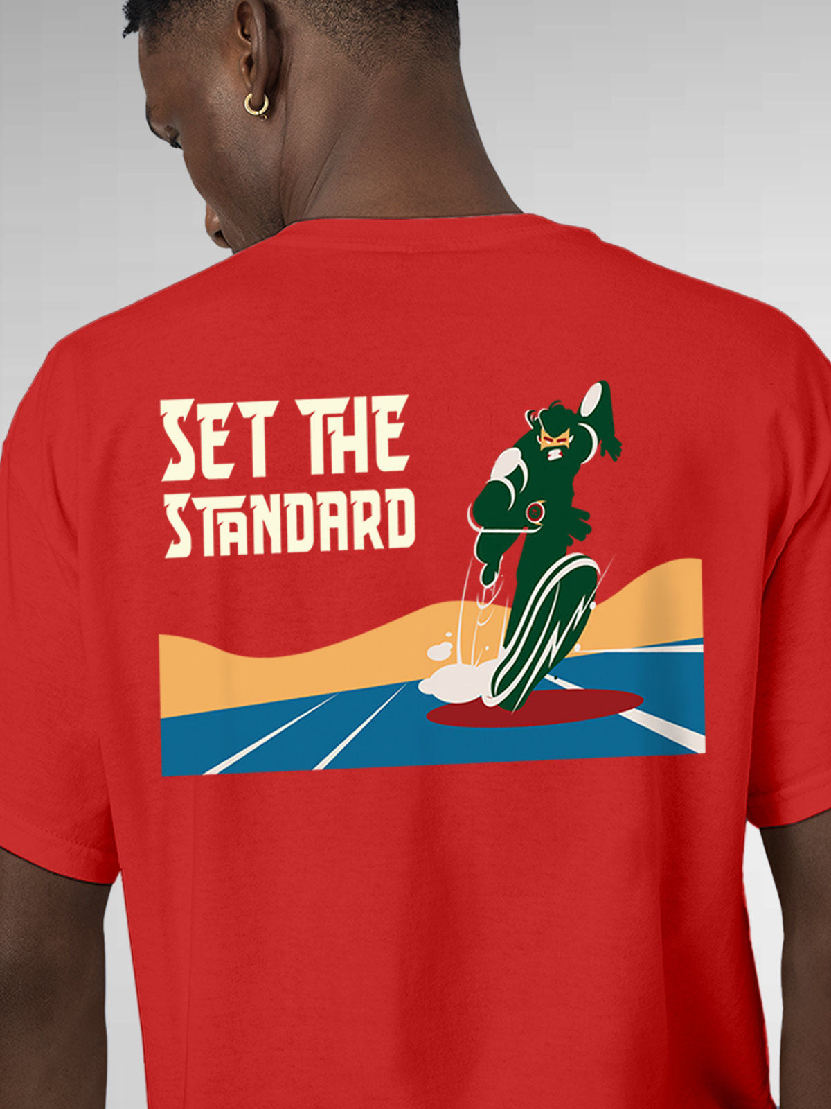Close up of 'Set The Standard' design on Men's Red Round Neck T-shirt, highlighting intricate details and vibrant print.