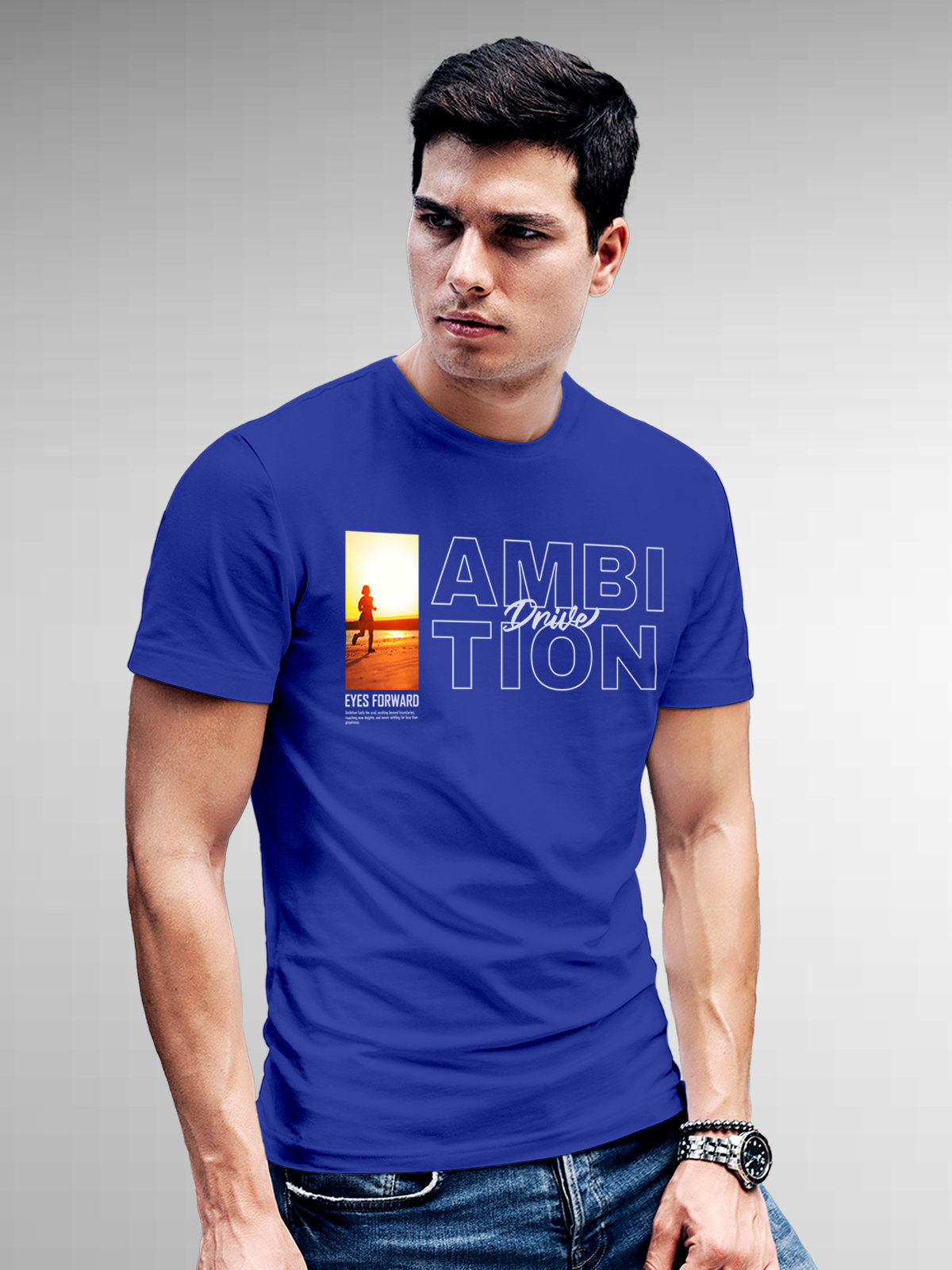 Model wearing Men's Blue Round Neck T-shirt with 'Ambition & Drive' design, offering effortless style and premium comfort