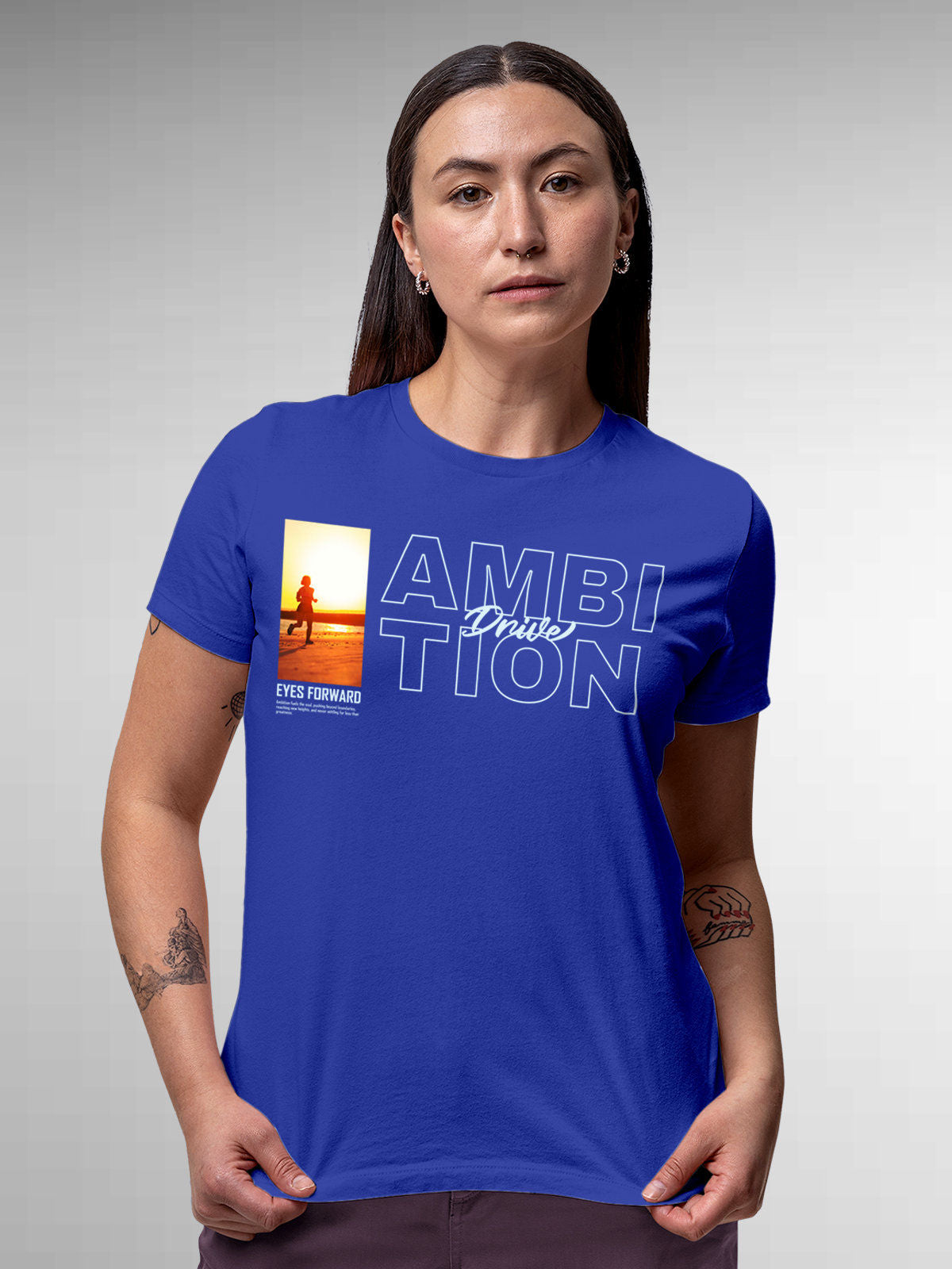 Model wearing Women's Blue Round Neck T-shirt with 'Ambition & Drive' design, offering effortless style and premium comfort