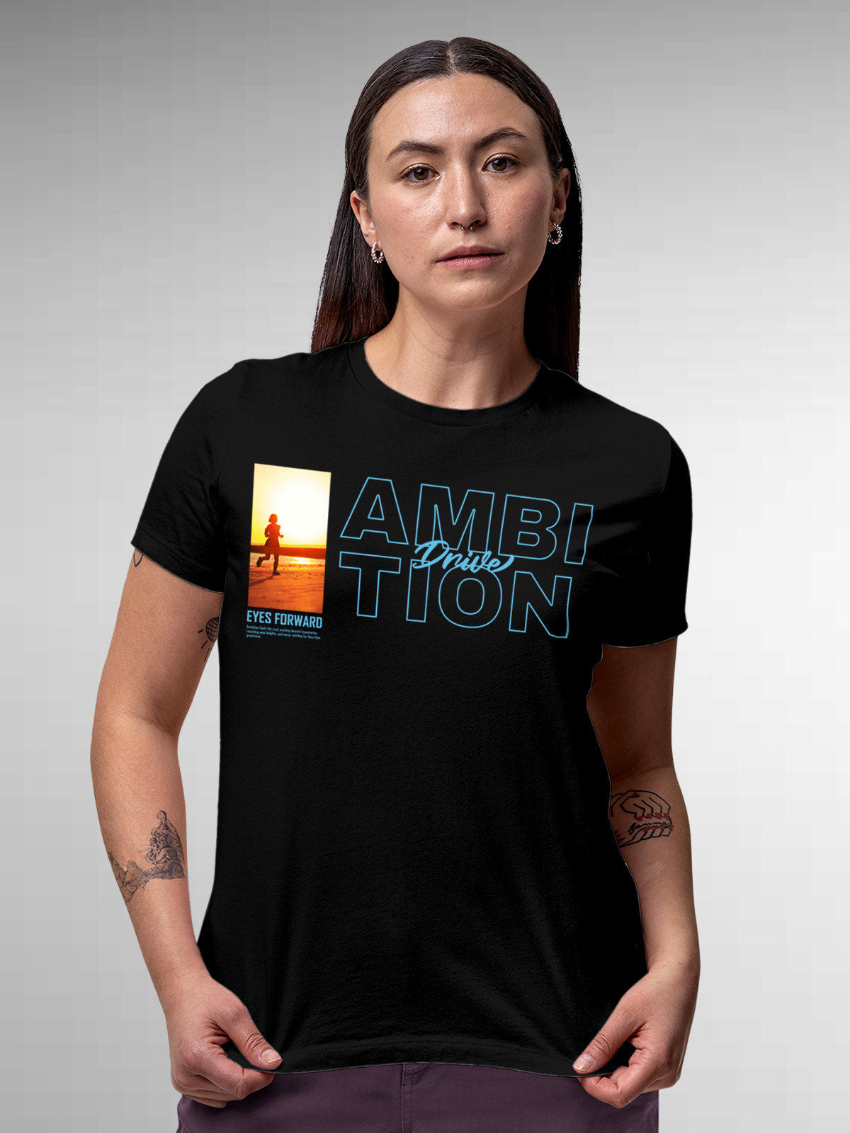 Model wearing Women's Black Round Neck T-shirt with 'Ambition & Drive' design, offering effortless style and premium comfort