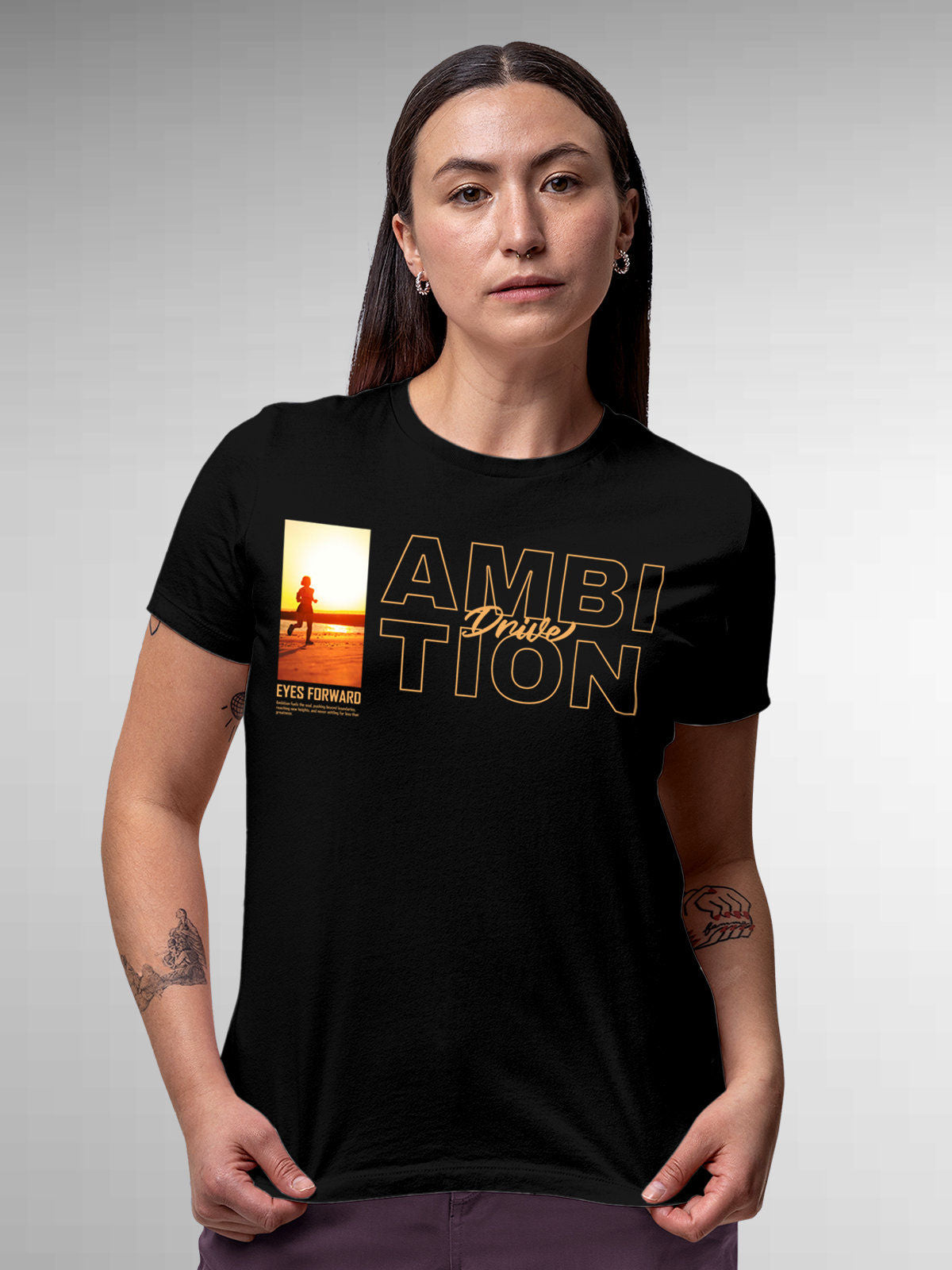Model wearing Women's Black Round Neck T-shirt with 'Ambition & Drive' design, offering effortless style and premium comfort
