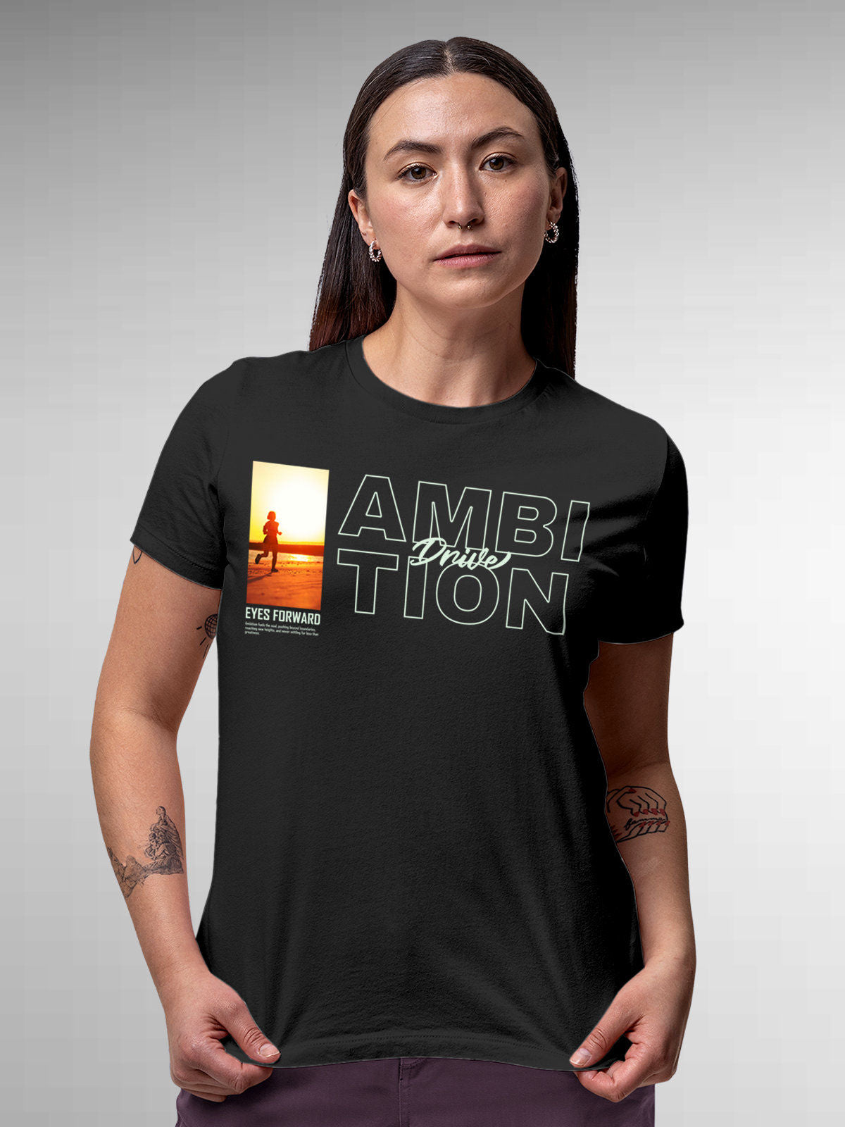 Model wearing Women's Dark Grey Round Neck T-shirt with 'Ambition & Drive' design, offering effortless style and premium comfort