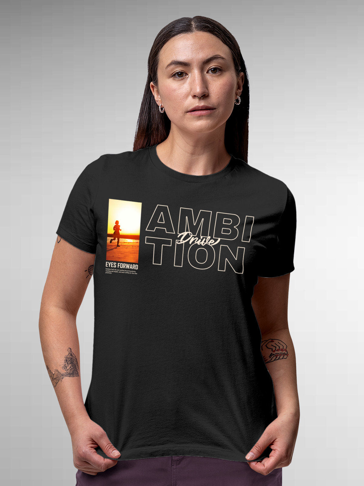 Model wearing Women's Dark Grey Round Neck T-shirt with 'Ambition & Drive' design, offering effortless style and premium comfort