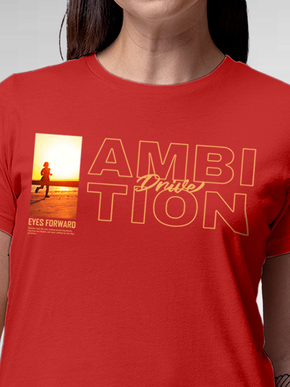 Close up of 'Ambition & Drive' design on Women's Red Round Neck T-shirt, highlighting intricate details and vibrant print.
