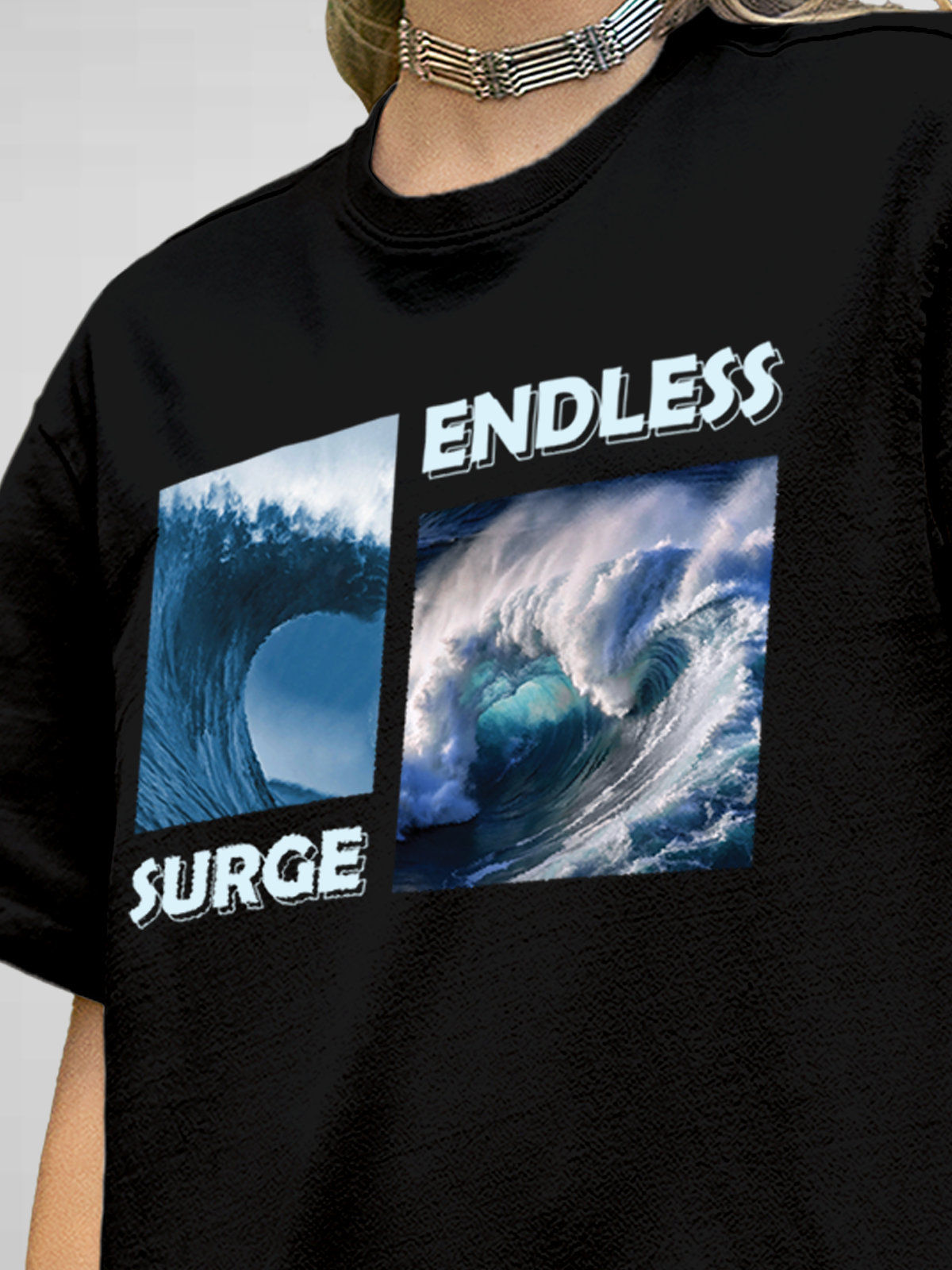 Close up of 'Endless Surge' design on Women's Black Round Neck T-shirt, highlighting intricate details and vibrant print.