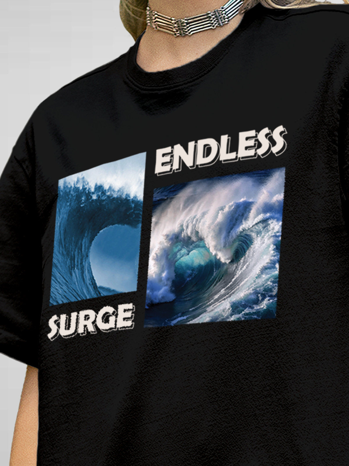 Close up of 'Endless Surge' design on Women's Black Round Neck T-shirt, highlighting intricate details and vibrant print.