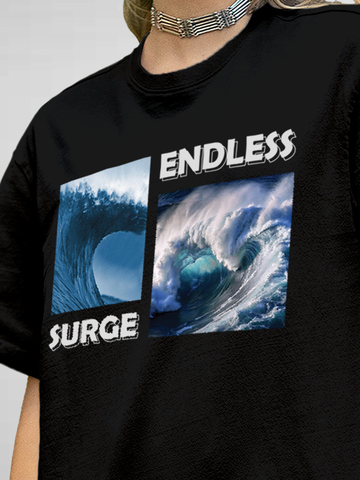 Close up of 'Endless Surge' design on Women's Black Round Neck T-shirt, highlighting intricate details and vibrant print.