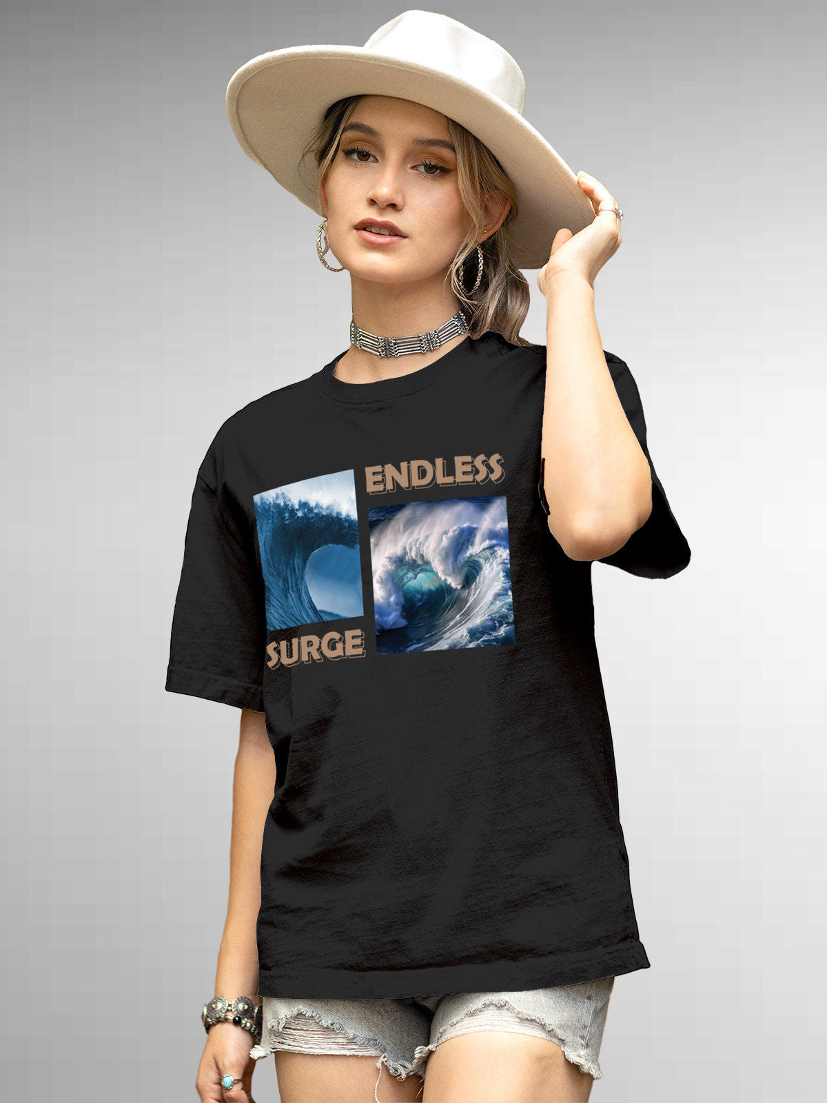 Model wearing Women's Dark Grey Round Neck T-shirt with 'Endless Surge' design, offering effortless style and premium comfort