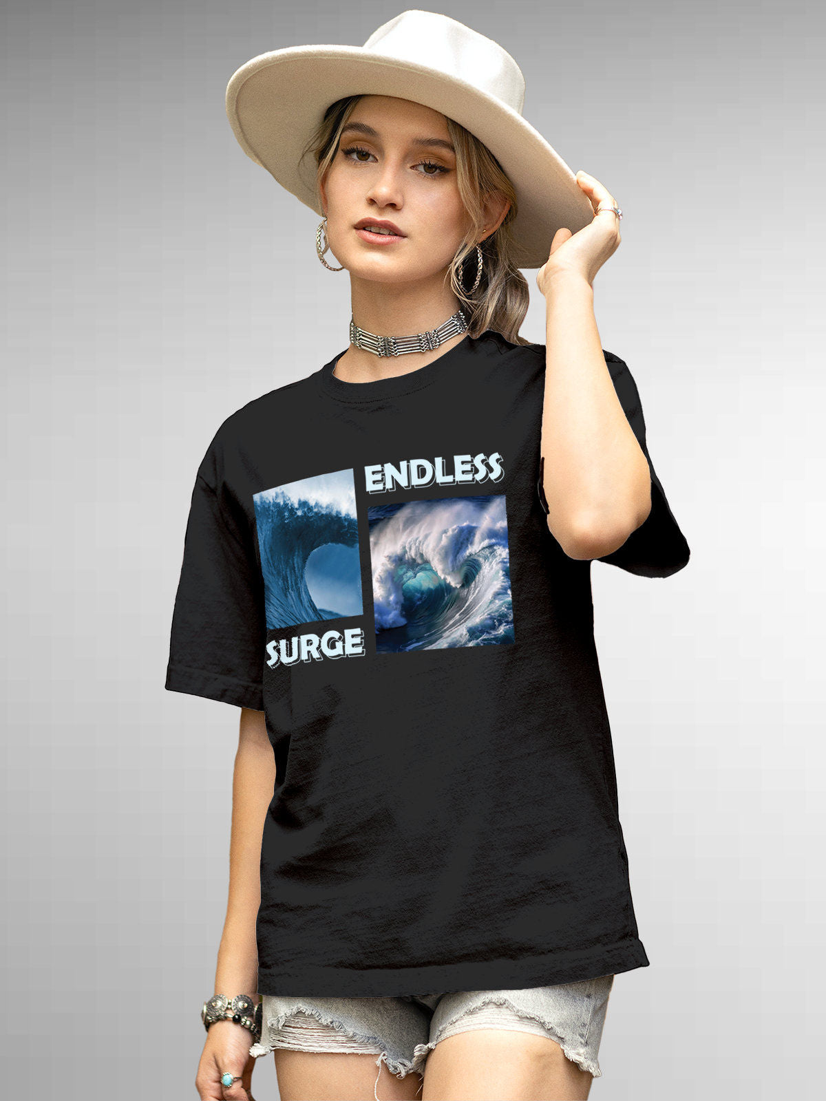 Model wearing Women's Dark Grey Round Neck T-shirt with 'Endless Surge' design, offering effortless style and premium comfort