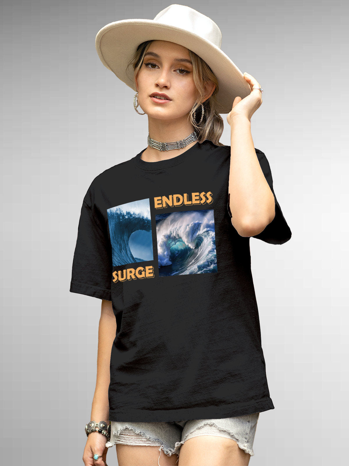 Model wearing Women's Dark Grey Round Neck T-shirt with 'Endless Surge' design, offering effortless style and premium comfort
