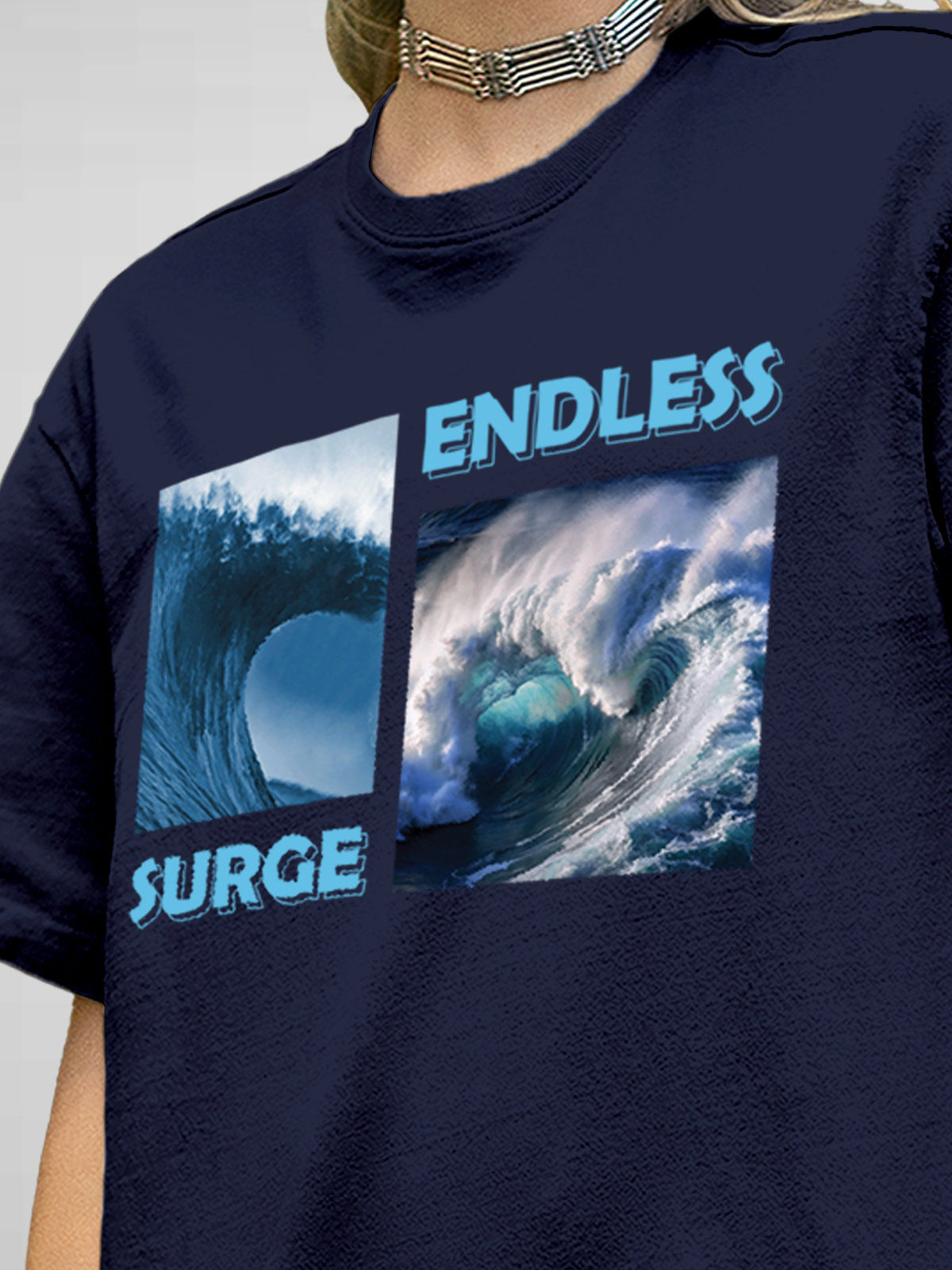 Close up of 'Endless Surge' design on Women's Navy Blue Round Neck T-shirt, highlighting intricate details and vibrant print.
