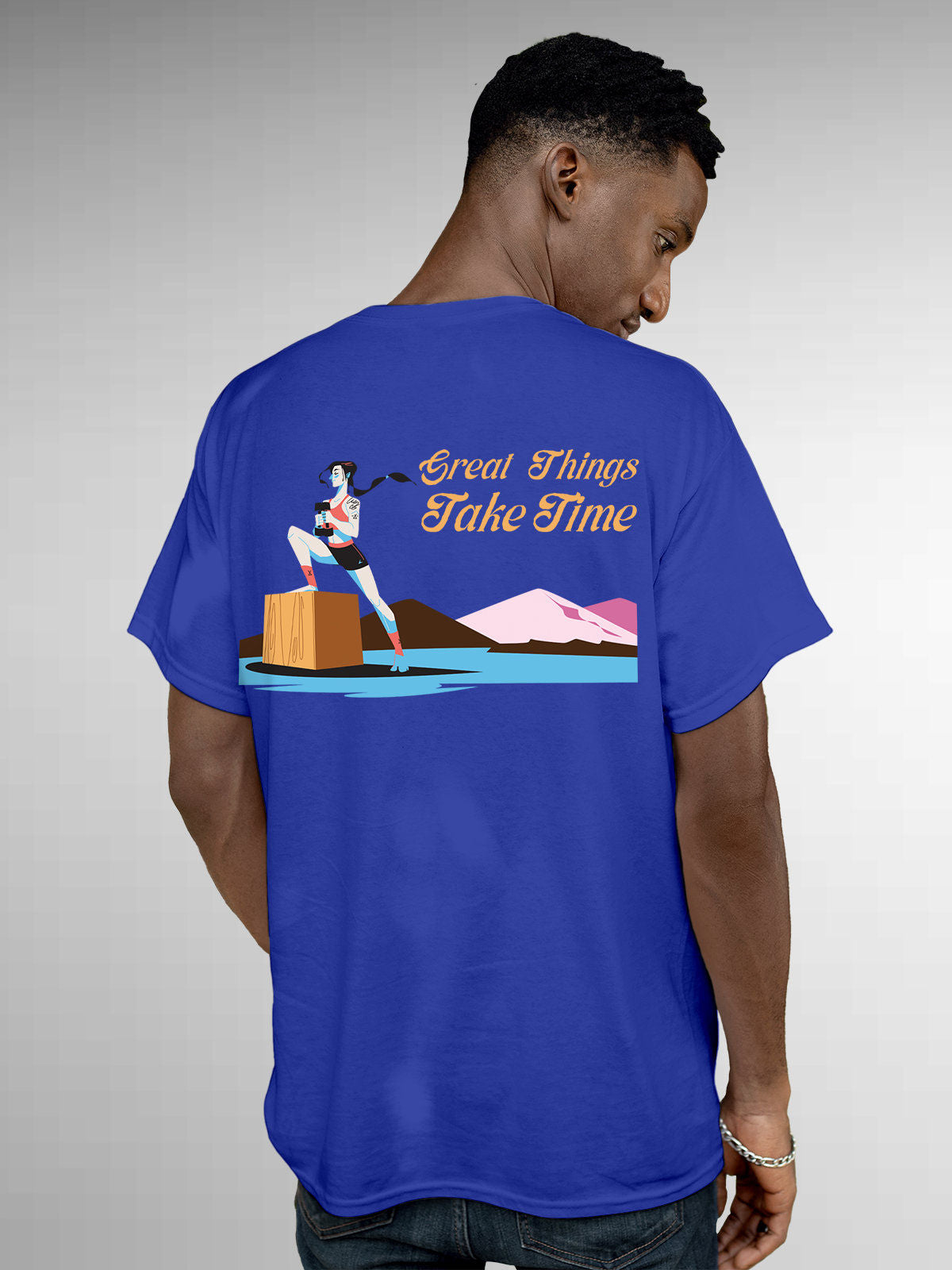 Model wearing Men's Blue Round Neck T-shirt with 'Great Things Take Time' design, offering effortless style and premium comfort
